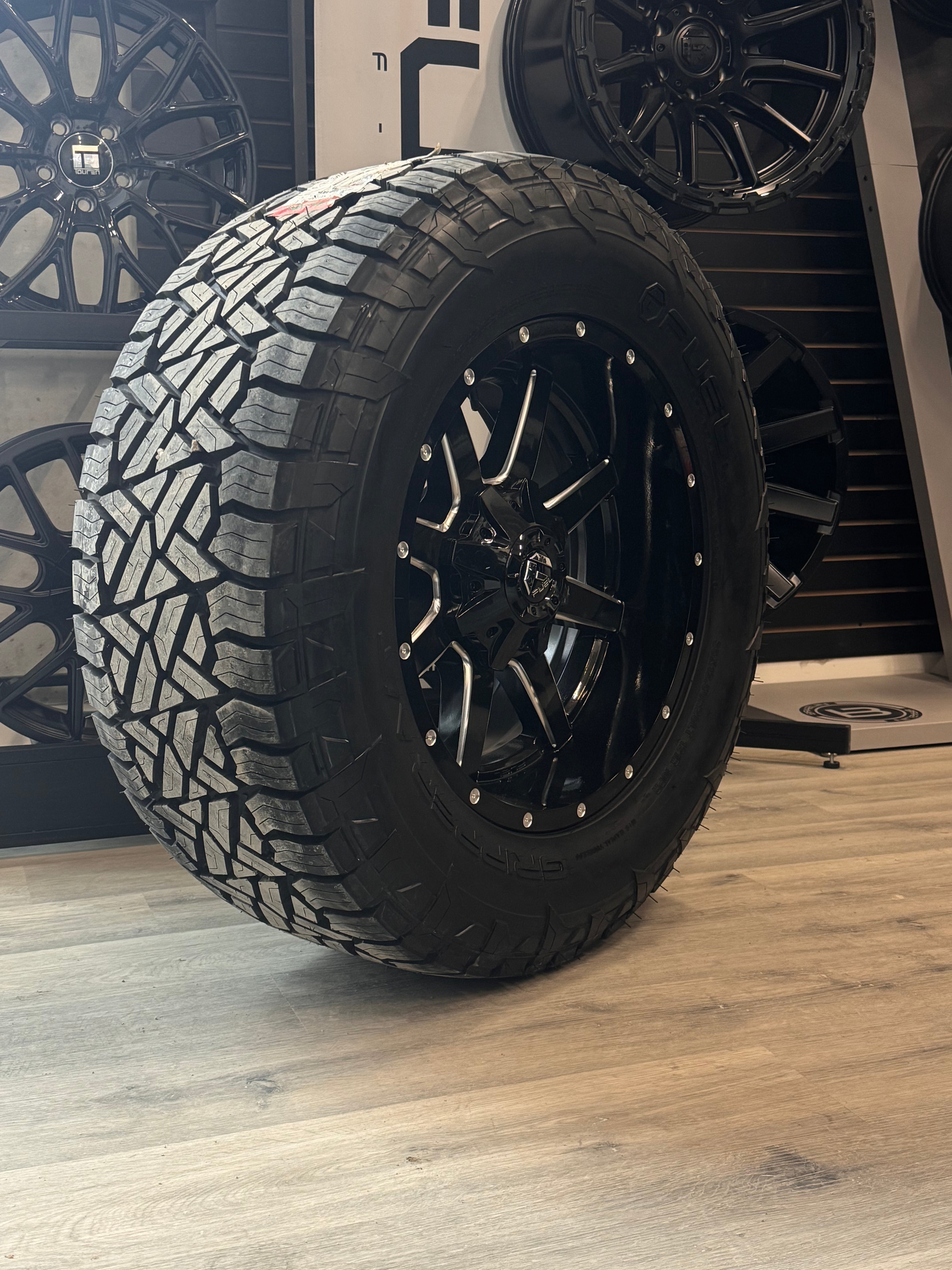 ( SET OF FOUR ) FUEL MAVERICK 20X10 -18 8X165.1 125.1 GLOSS BLK MILL | 35X12.50R20 FUEL GRIPPER AT