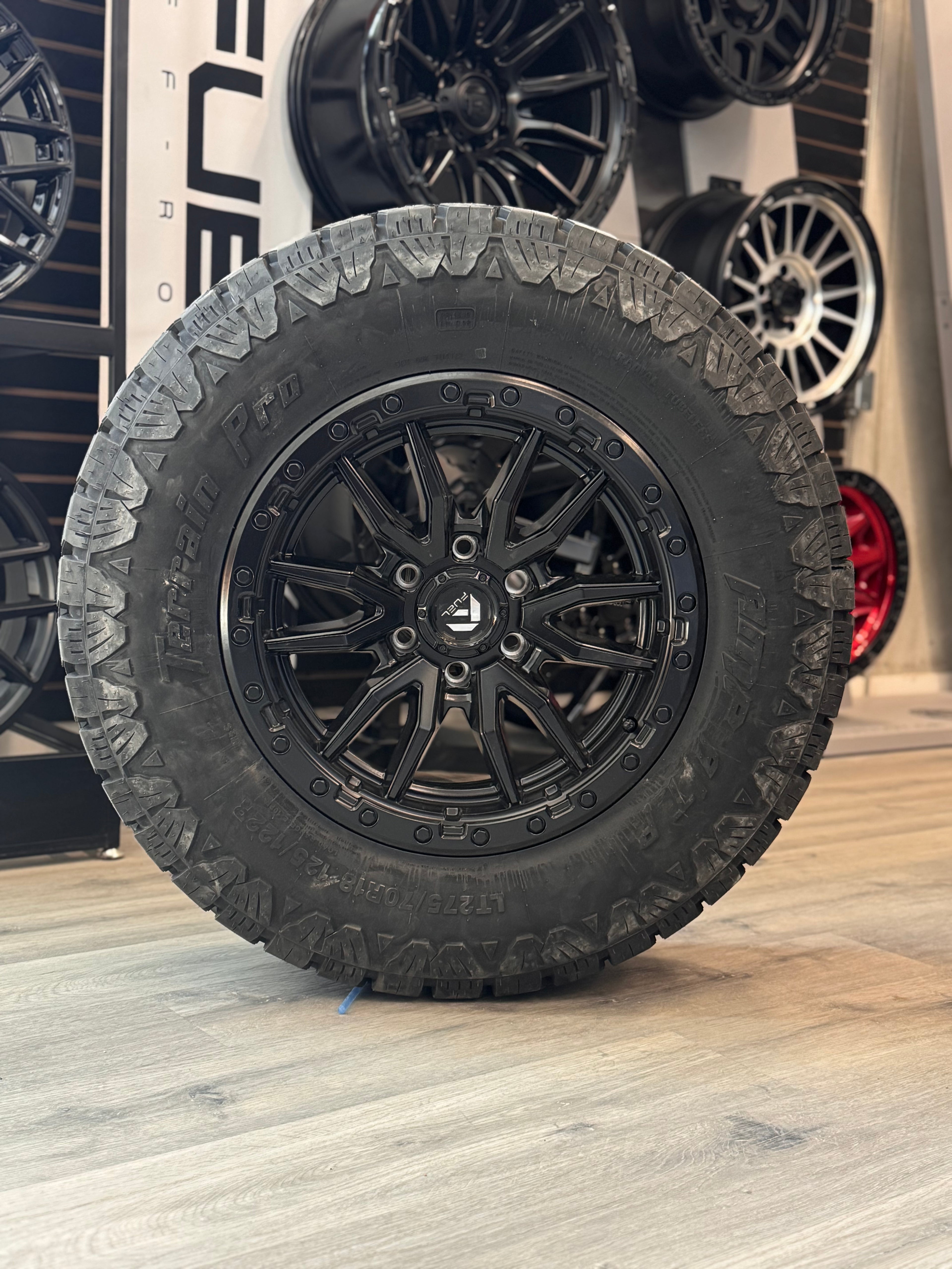 ( SET OF FOUR ) FUEL REBEL 18X9 +20 6X135 87.1 MATTE BLACK | LT 275/70R18 AMP TERRAIN PRO