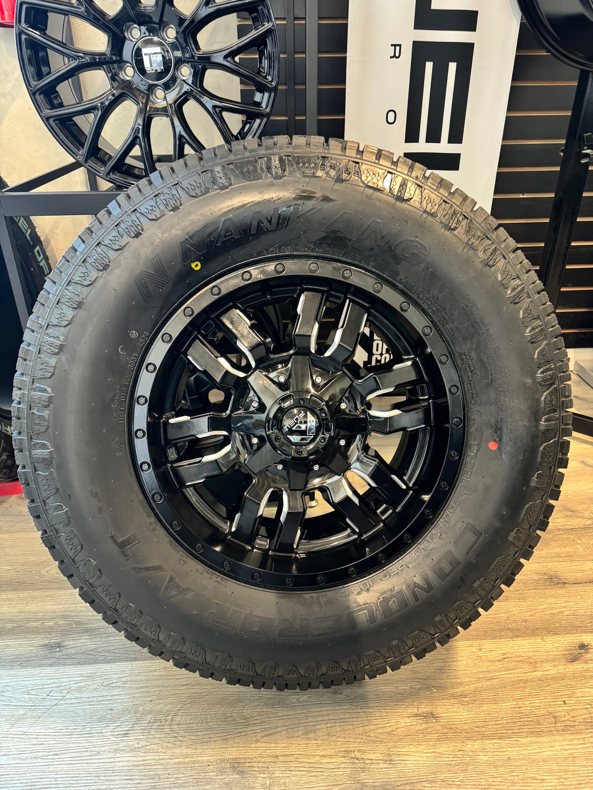 ( SET OF FOUR ) FUEL OFFROAD D595 SLEDGE GLOSS BLACK MILLED 18X9 +20 8X180mm 124.2mm | NANKANG AT-5 CONQUEROR A/T LT 295/70R18 129/126Q E/10 3PMS