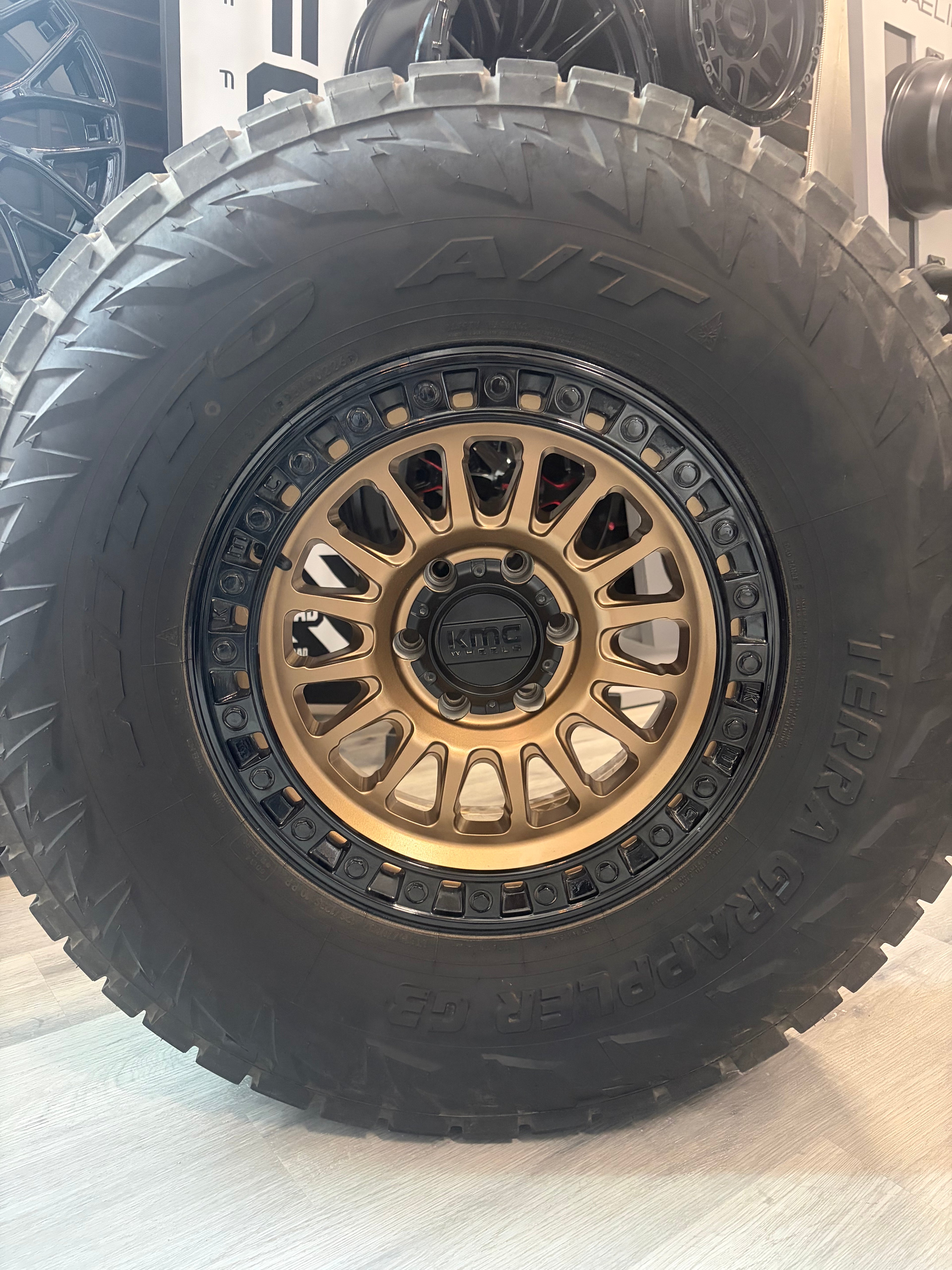 ( SET OF FOUR ) KMC IMS 17X8.5 -10 6X135 87 M-BRNZ G-BLK | 315/70R17 NITTO G3 3PMS *TAKE OFF*