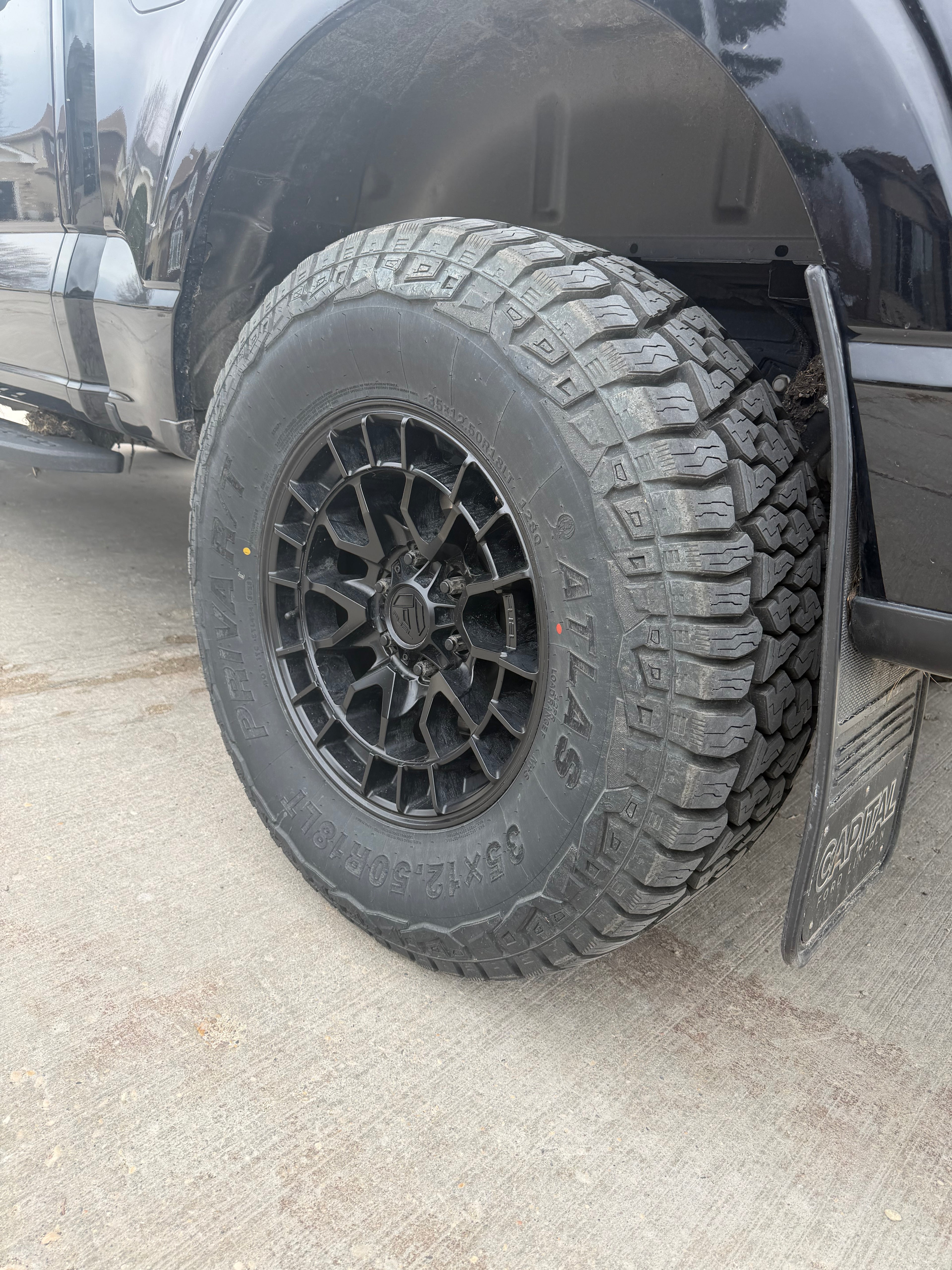 (SET OF FOUR) FUEL REVOLT 18X9 +20 6X135 87 MATTE BLACK | LT 35X12.50R18 ATLAS PRIVA R/T 12PR *** TAKEOFFS 500KM ***