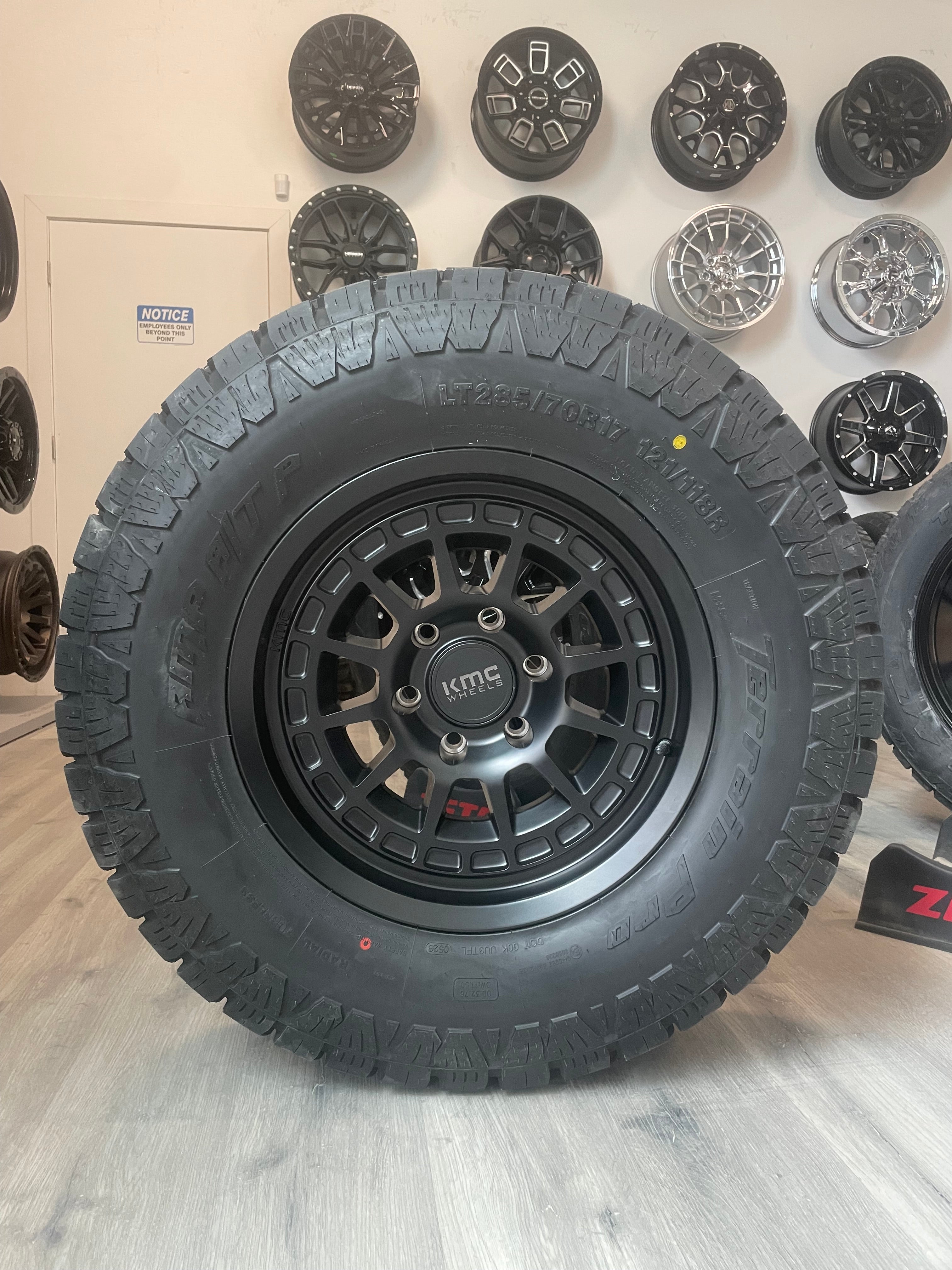 ( SET OF FOUR ) KMC KM719 17X8.5 0 6X139.7 SATIN BLACK | 285/70R17 AMP TERRAIN PRO