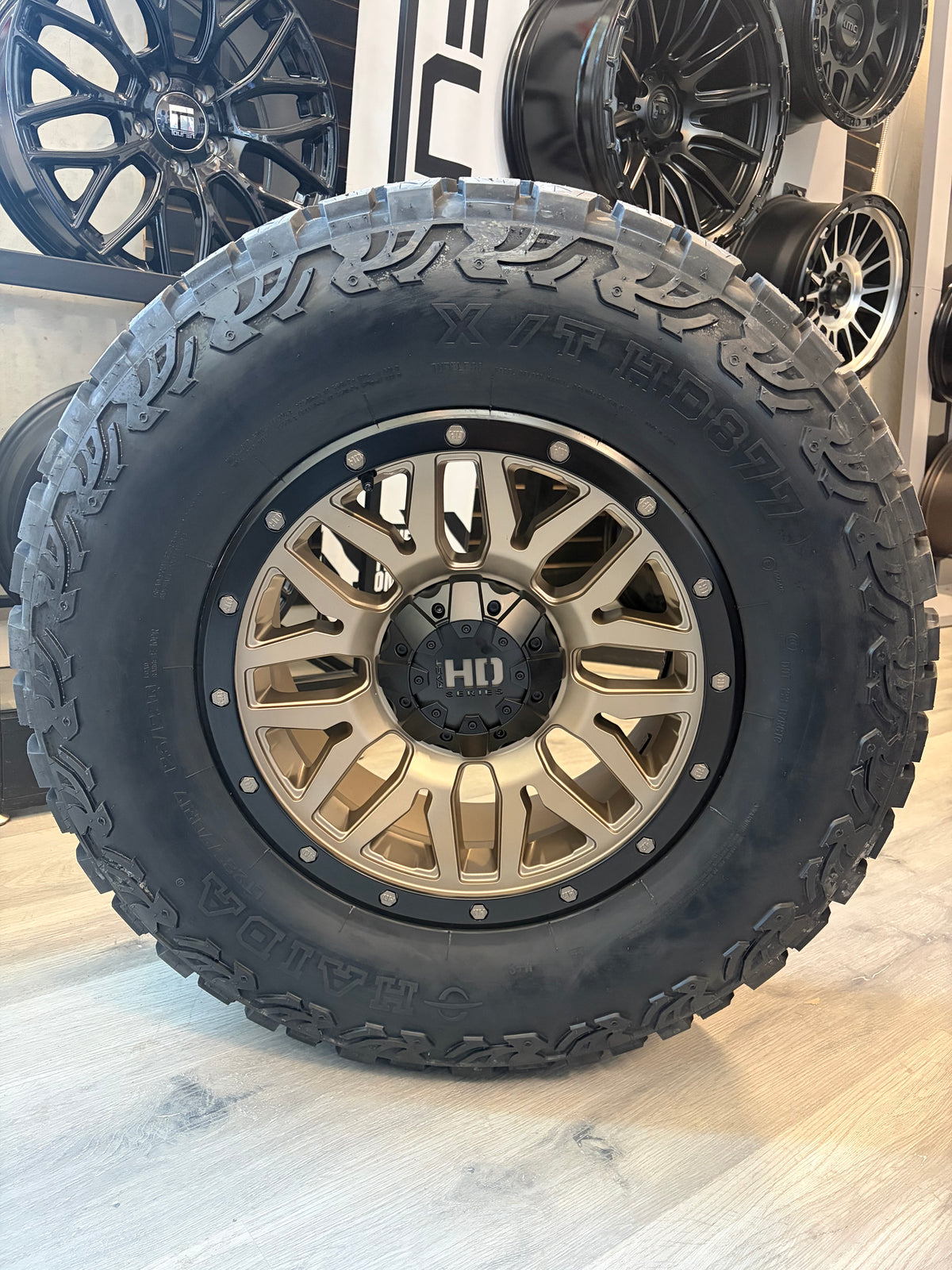 (SET OF FOUR) FAST HD MENACE SATIN BRONZE/BLACK BEADLOCK 17X8 +0 6X139.7MM 106.1MM | HAIDA HD 877 XT LT 285/70R17 (10 PLY)