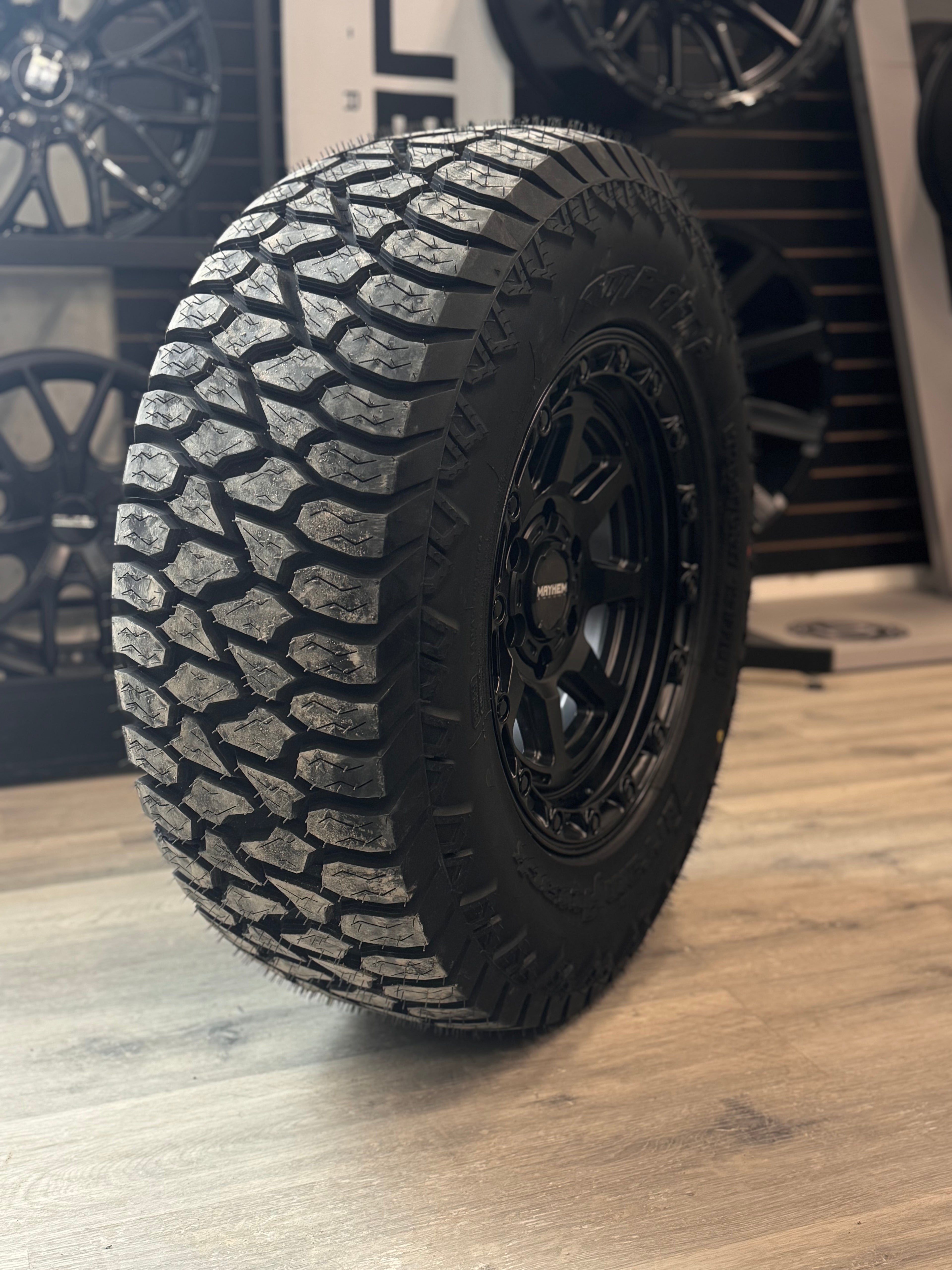(SET OF FOUR) MAYHEM RIDGELINE 8306 SATIN BLK 17X8.5 6X139.7 +6 106.1MM | LT 265/70R17 AMP TERRAIN ATTACK AT