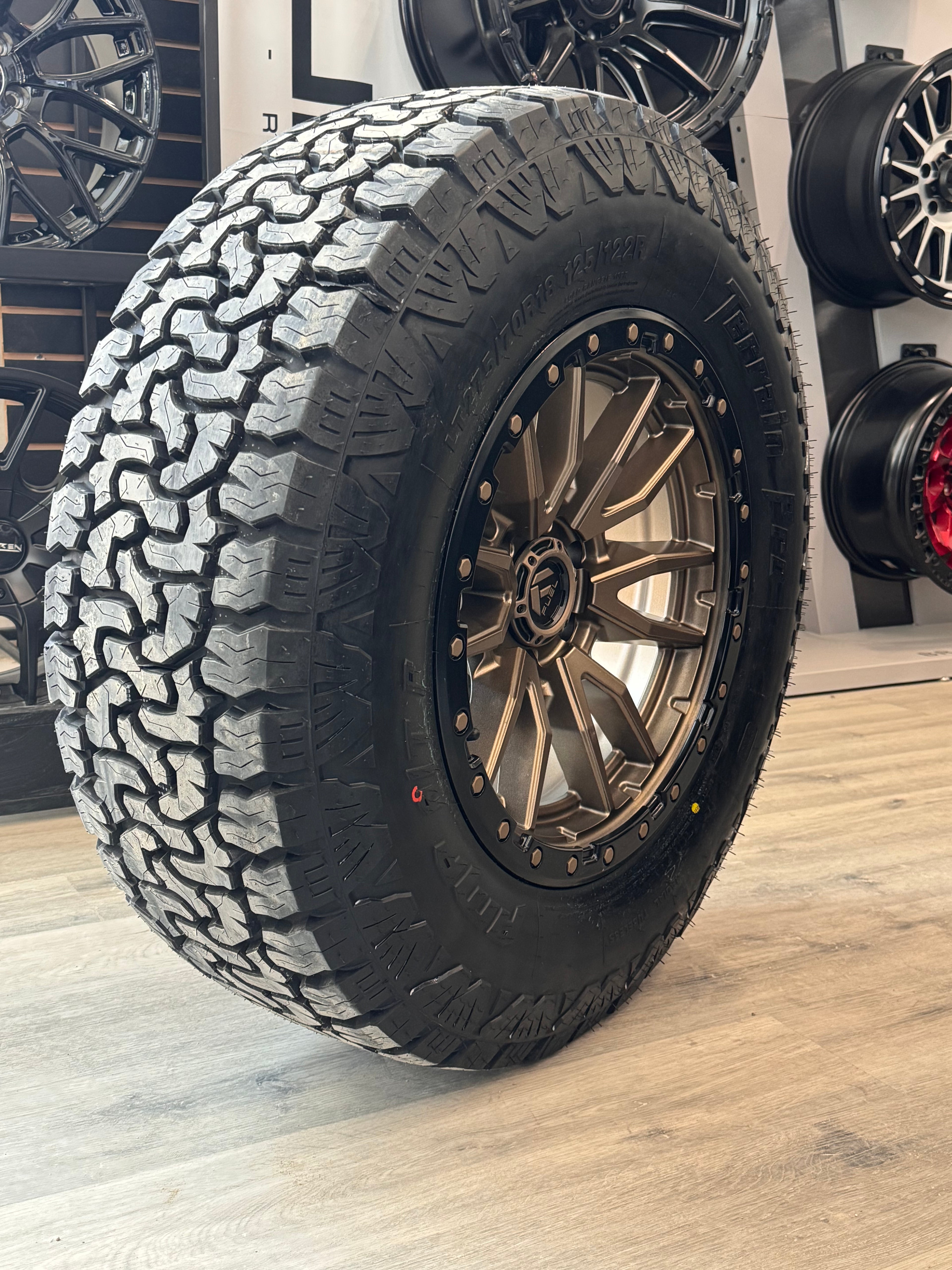 ( SET OF FOUR ) FUEL REBEL 18X9 +1 6X135 87.1 MATTE BRONZE BLACK BEAD RING | LT 275/70R18 AMP TERRAIN PRO