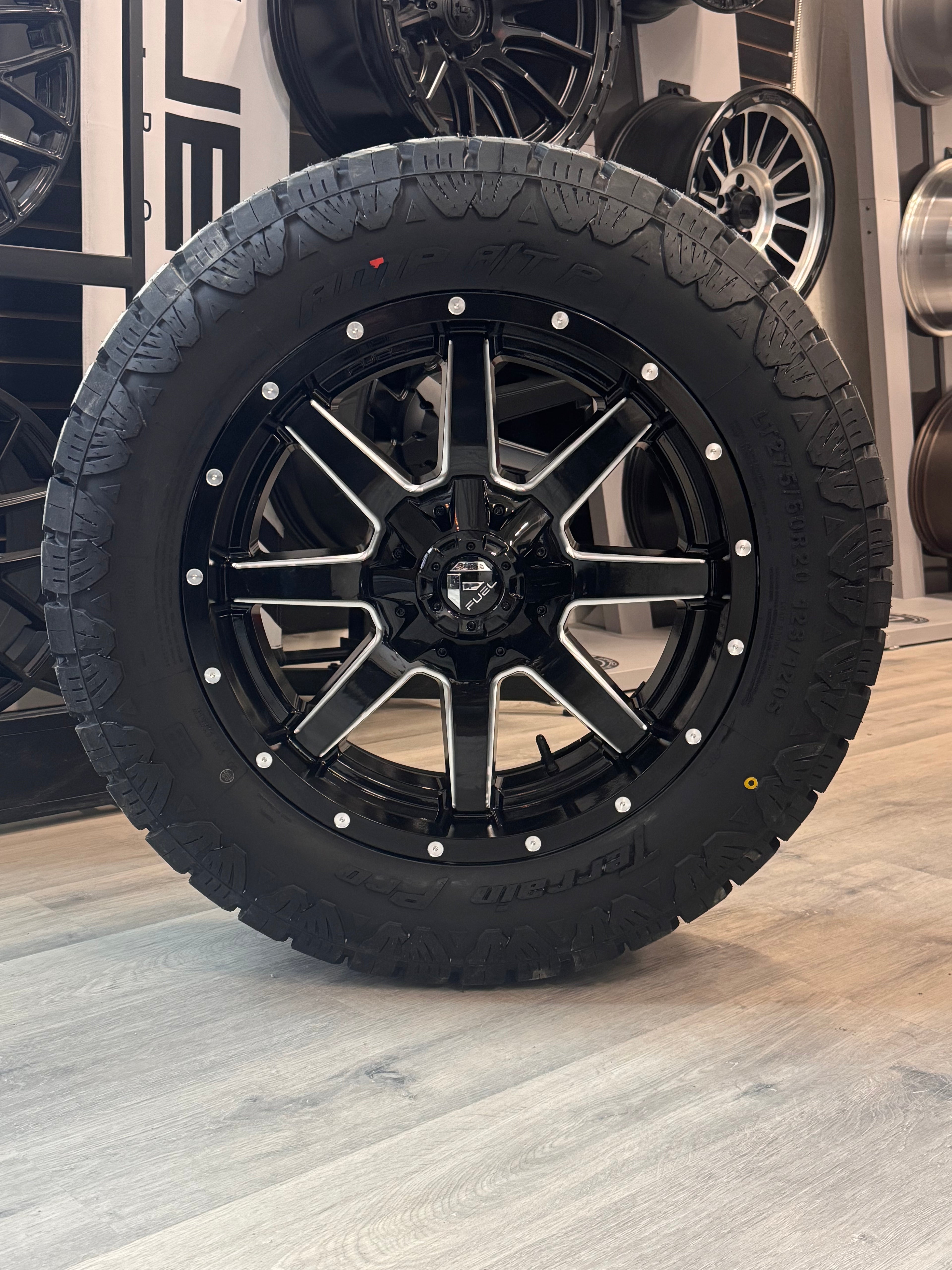 ( SET OF FOUR ) FUEL MAVERICK 20X9 +1 6X135/6X139.7 106.1 GLOSS BLK MILL | LT 275/60R20 AMP TERRAIN PRO