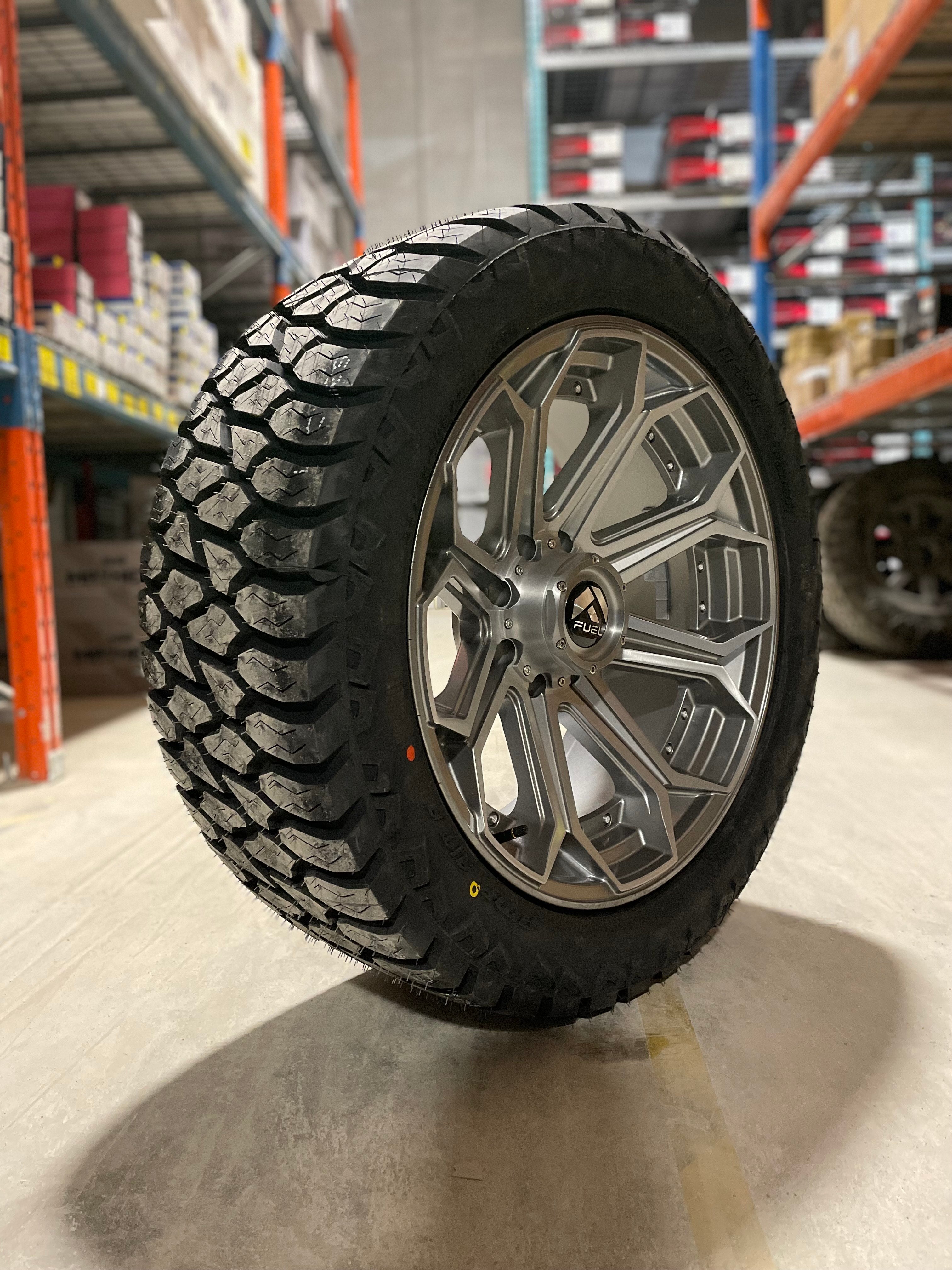(SET OF FOUR) Fuel Siege 22x10 8x165.1 -18 Gloss Anthracite | 33x12.50r22 Amp Attack AT ( Ram 2500/GM 2500 )