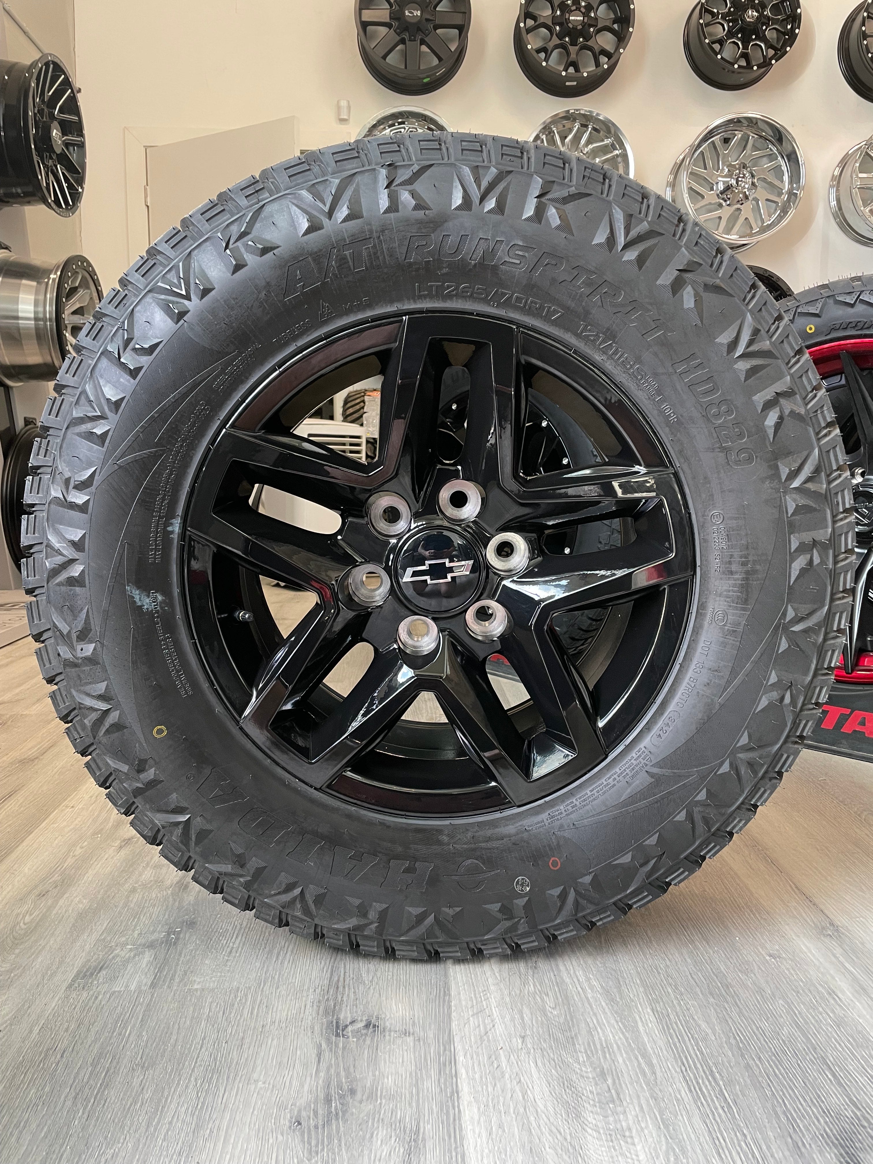 (SET OF FOUR) CHEVY TRAILBOSS OEM Reps 17x8 6x139.7 +24 Gloss BLK | 265/70r17 Haida 829 3PMS ( Sierra, Silverado, Ram )