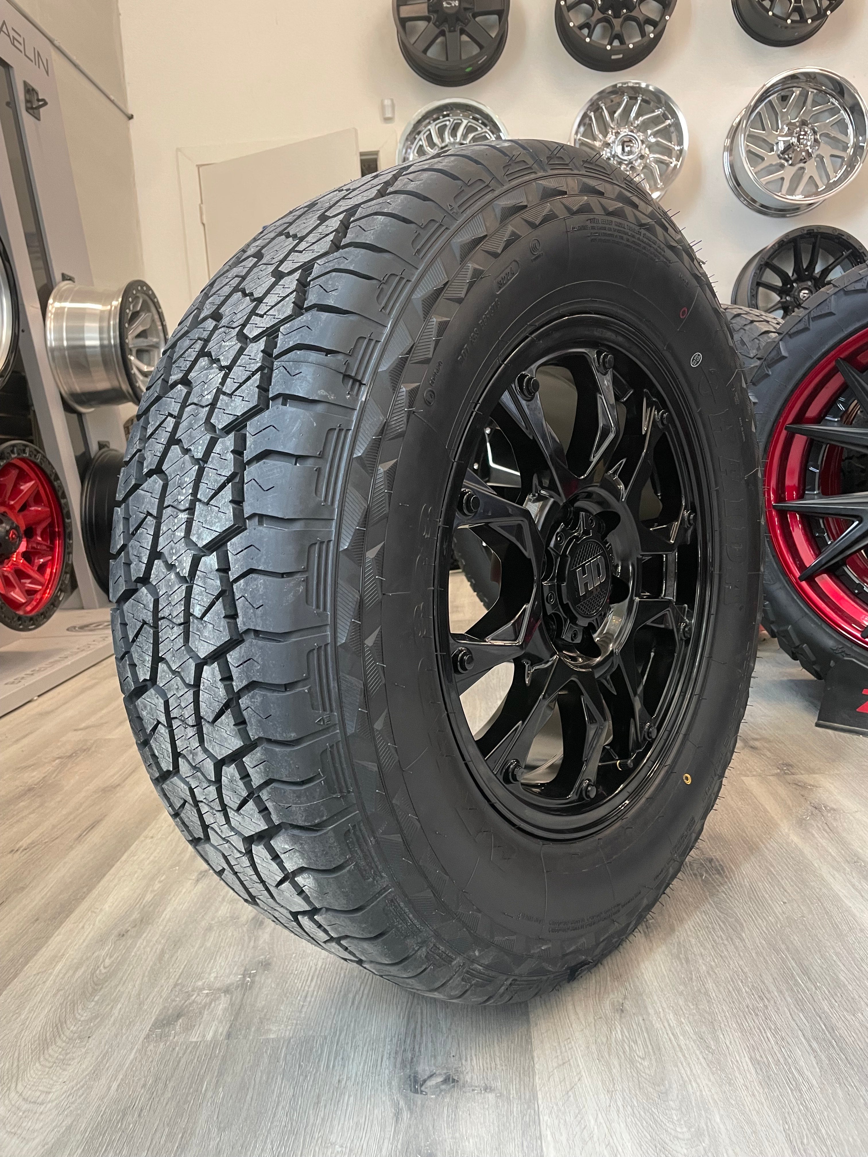 (SET OF FOUR) Fast HD Tactical 18x8 6x135 +40 Gloss BLK | LT275/65r18 Haida 828 3PMS