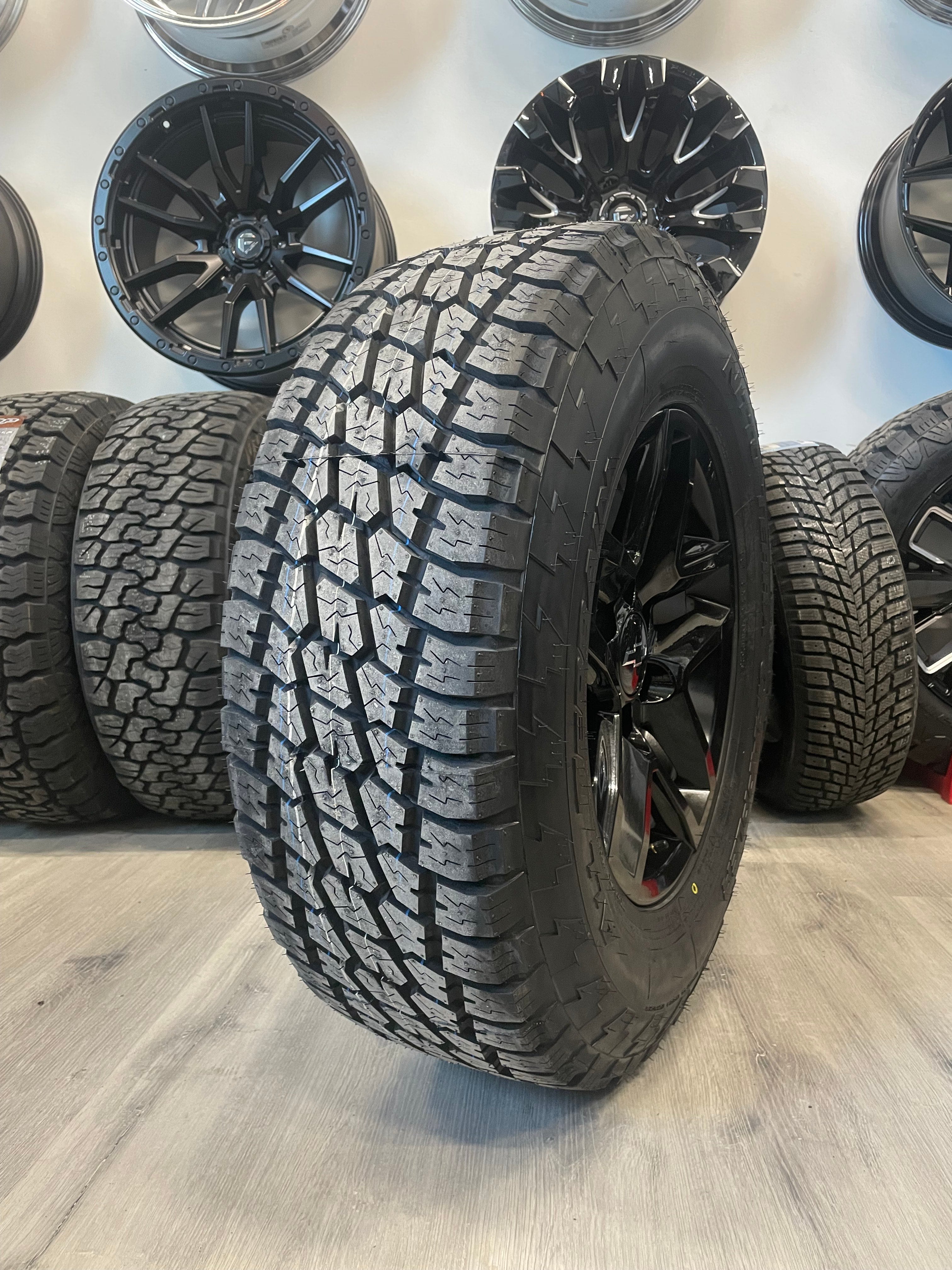 (SET OF FOUR) CHEVY/GMC TRAILBOSS OEM R245 17x8 6x139.7 +24 Gloss BLK | 265/70r17 NITTO TERRA GRAPPLER ( Sierra, Silverado, Yukon, Tahoe )