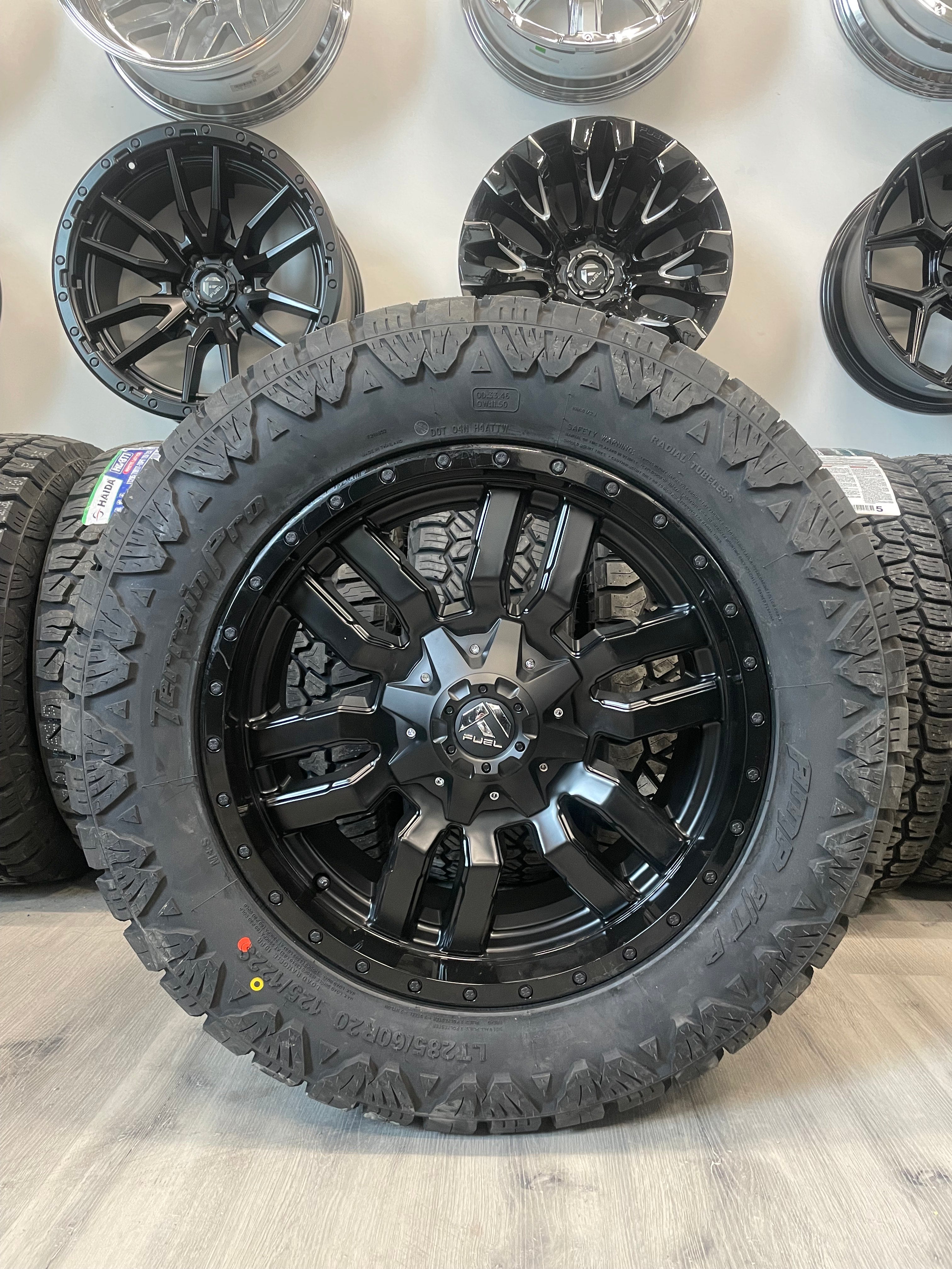 (SET OF FOUR) Fuel Sledge 20x9 8x180 +20 Matte BLK/Gloss BLK Lip | LT285/60r20 Amp Terrain Pro