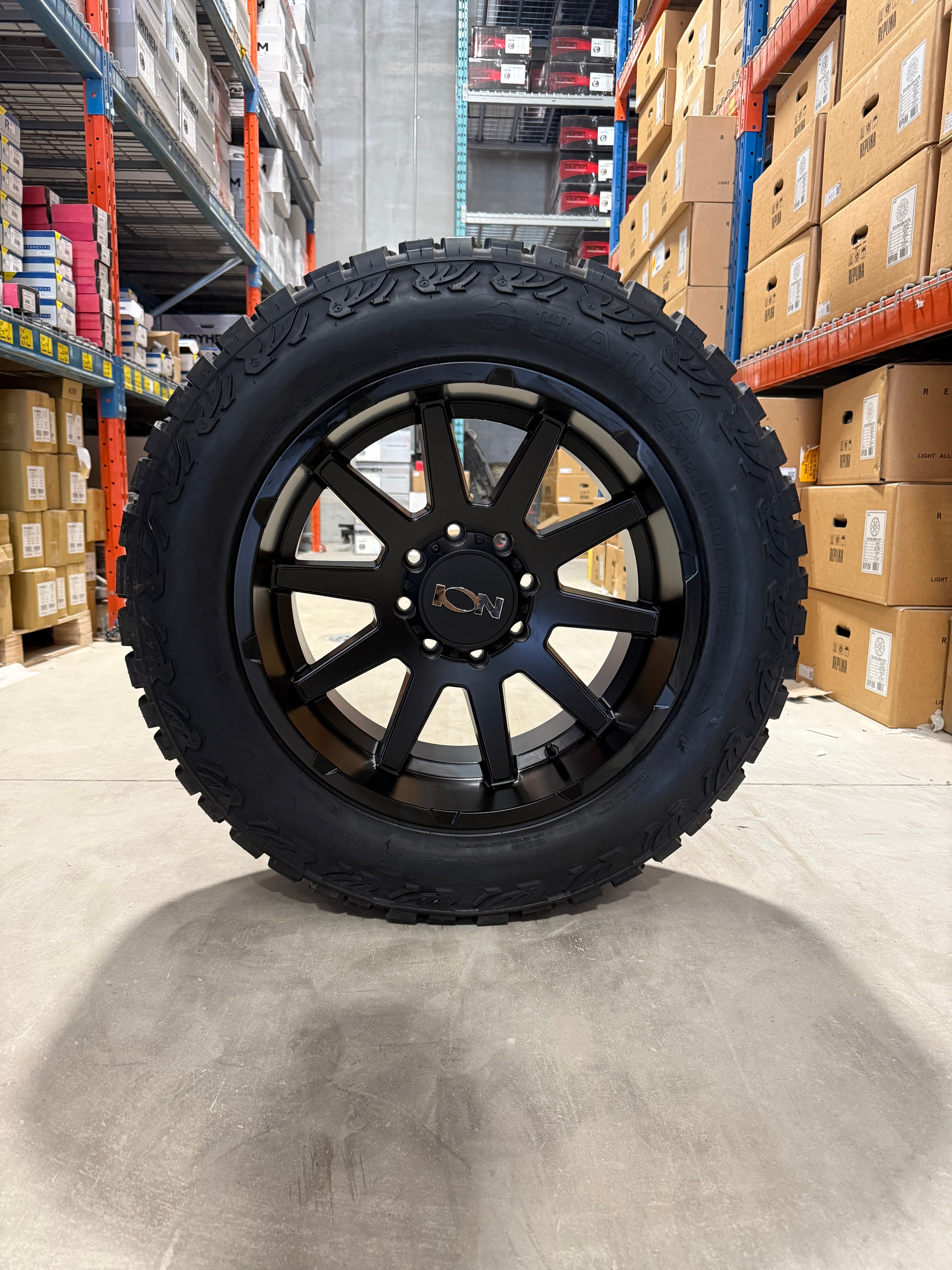 (SET OF FOUR) ION 143 20x10 8x165.1 -19 Matte BLK | 33x12.50r20LT Haida HD 877 X/T 3PMS