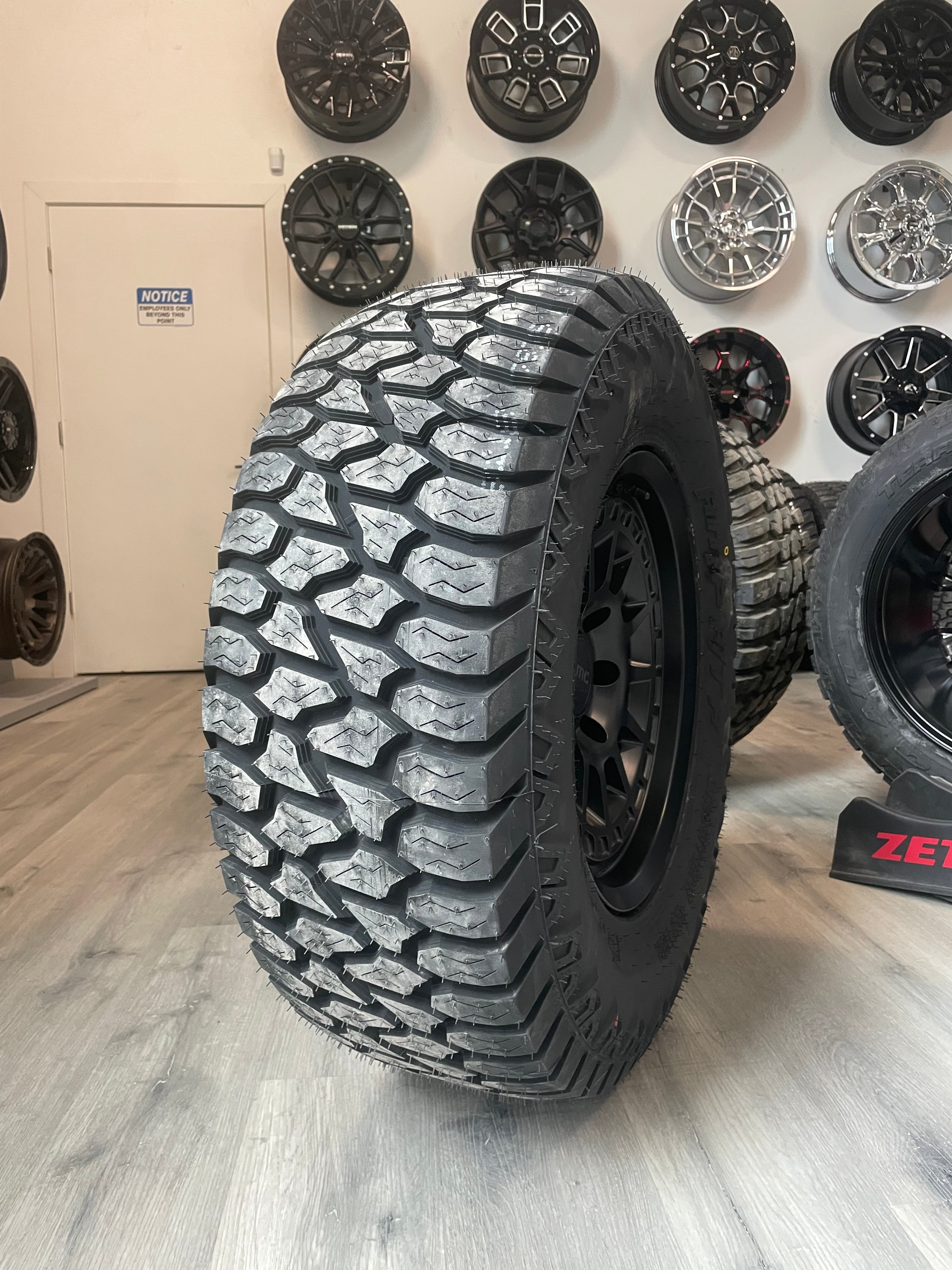 ( SET OF FOUR ) KMC KM719 17X8.5 0 6X139.7 SATIN BLACK | 285/70R17 AMP TERRAIN ATTACK AT