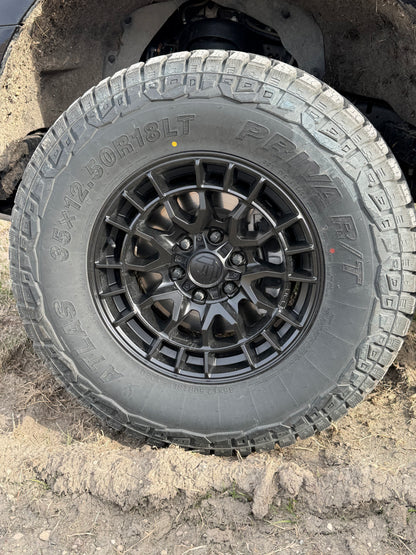 (SET OF FOUR) FUEL REVOLT 18X9 +20 6X135 87 MATTE BLACK | LT 35X12.50R18 ATLAS PRIVA R/T 12PR *** TAKEOFFS 500KM ***