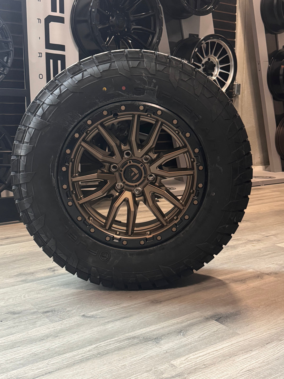 ( SET OF FOUR ) FUEL REBEL 18X9 +1 6X135 87.1 MATTE BRONZE BLACK BEAD RING | LT 285/65R18 FUEL GRIPPER AT
