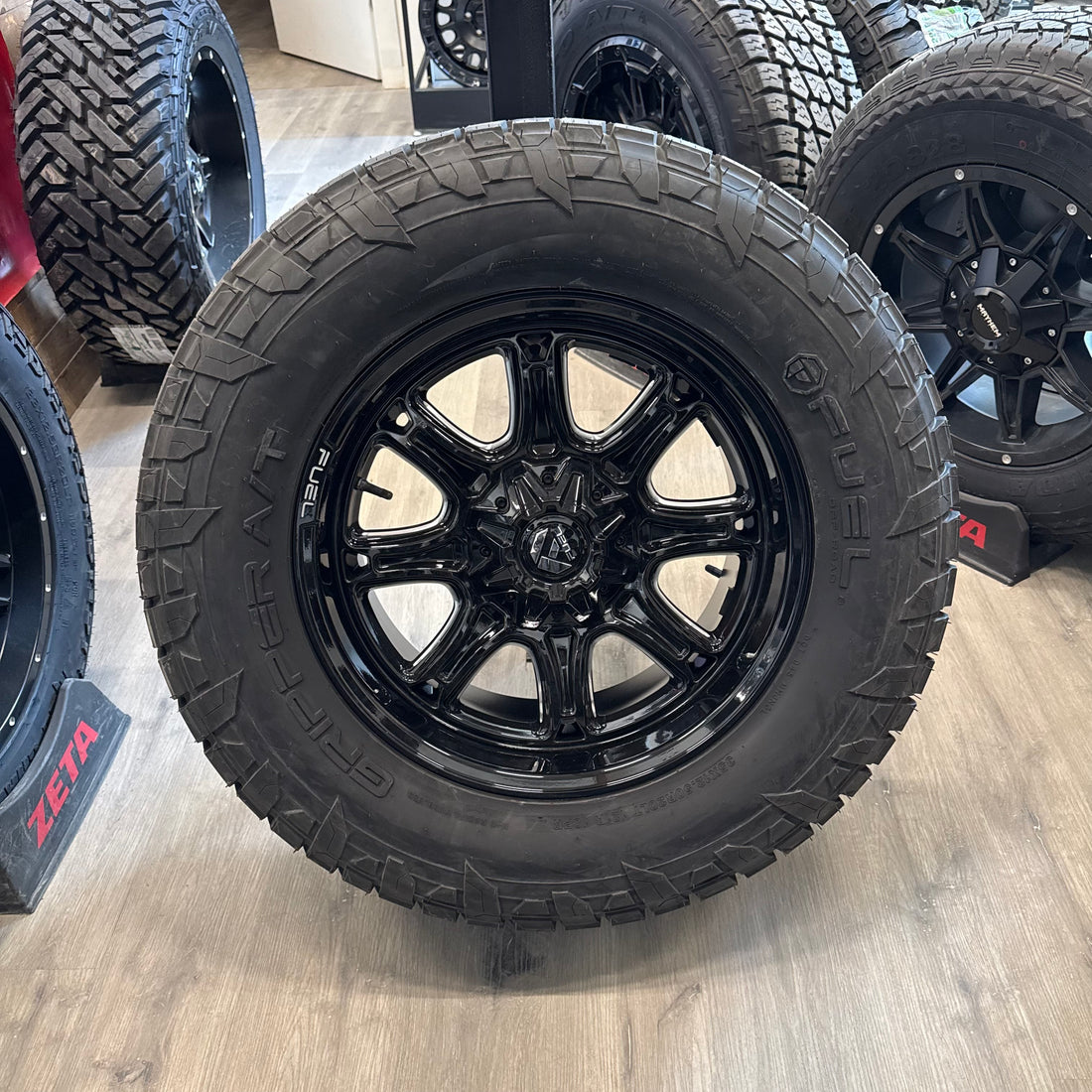 ( SET OF FOUR ) FUEL DARKSTAR 20X9 +1 5X127/5X139.7 87 GLOSS BLACK MILLED | FUEL GRIPPER AT 35X12.50R20