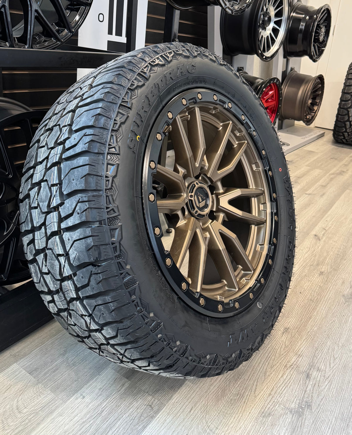 ( SET OF FOUR ) FUEL REBEL 20X9 6X139.7 +1 MATTE BRONZE BLACK BEAD RING | LT 275/55R20 SURETRAC AWT 3PMS