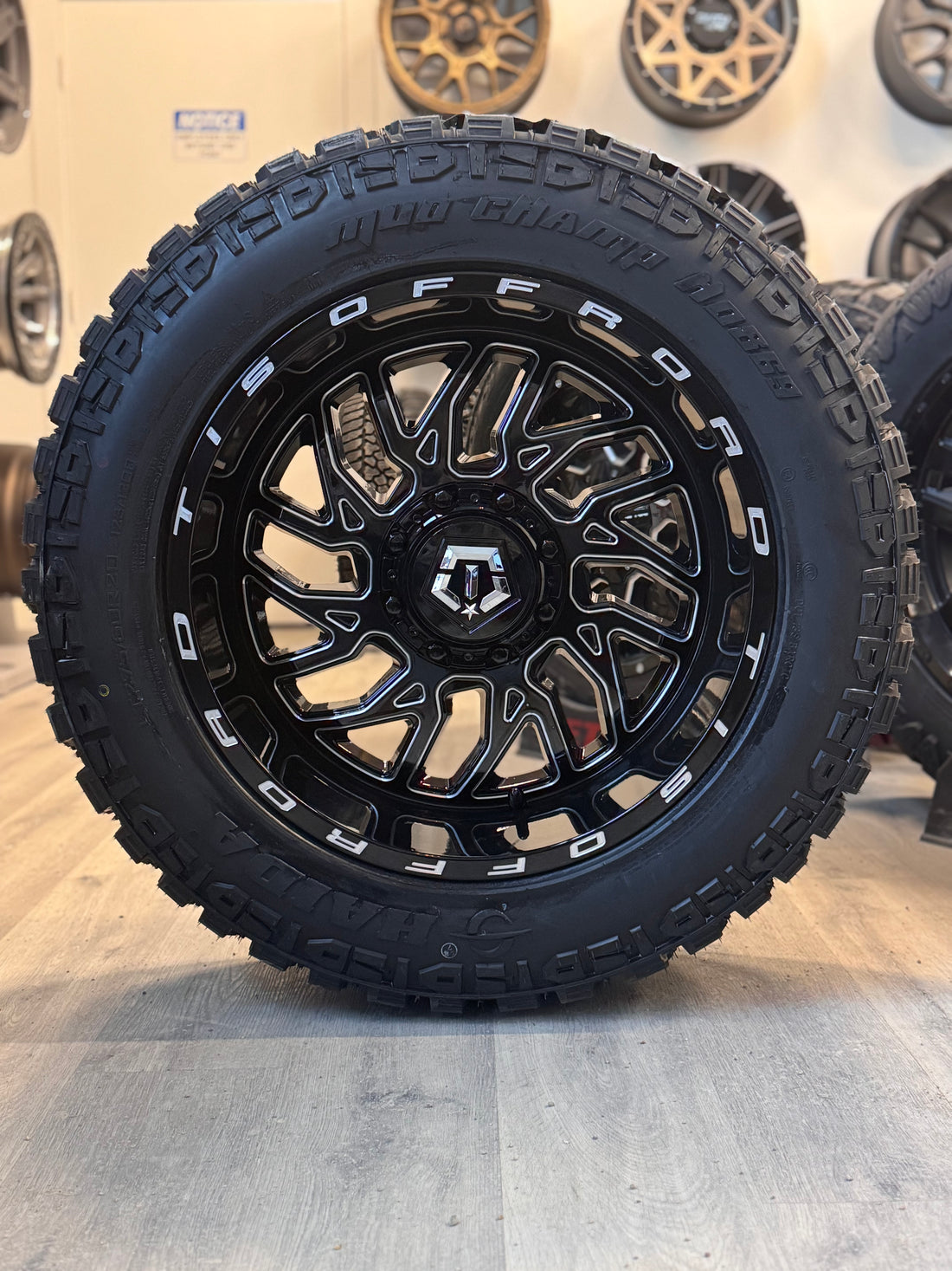 (SET OF FOUR) TIS 544 GLOSS BLACK - MILLED EDGE 20X10.0 -25 6X135/6X139.7MM 108.1MM | 275/60R20 HAIDA 869 MUD CHAMP 3PMS