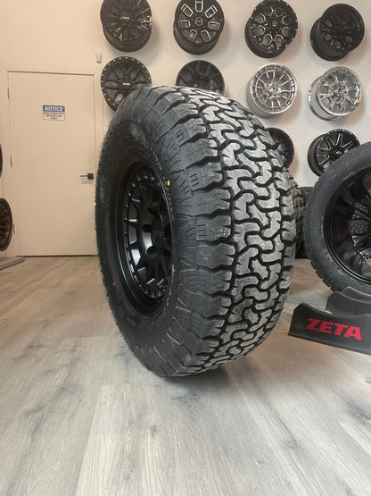 ( SET OF FOUR ) KMC KM719 17X8.5 0 6X139.7 SATIN BLACK | 285/70R17 AMP TERRAIN PRO