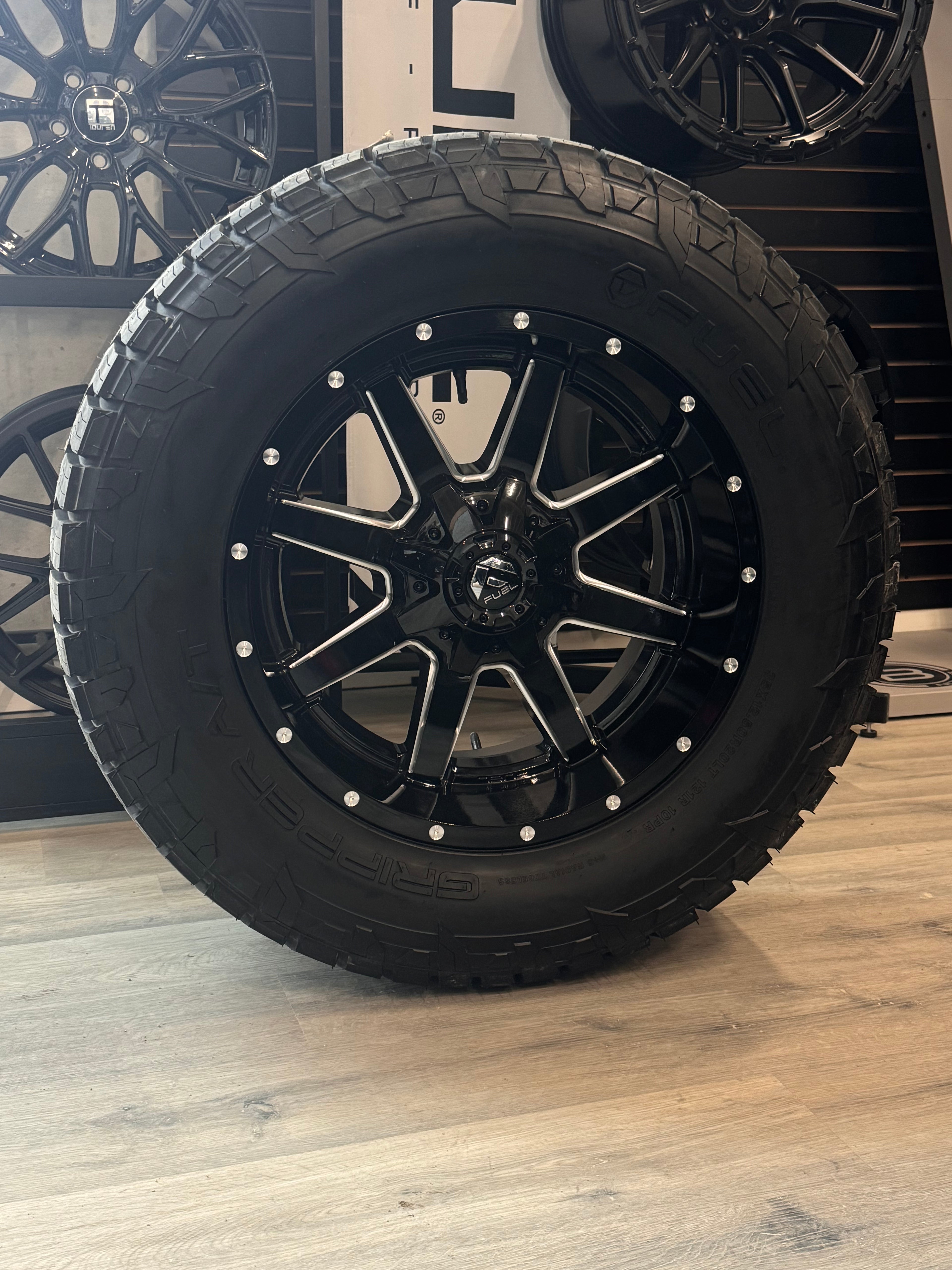 ( SET OF FOUR ) FUEL MAVERICK 20X10 -18 8X165.1 125.1 GLOSS BLK MILL | 35X12.50R20 FUEL GRIPPER AT