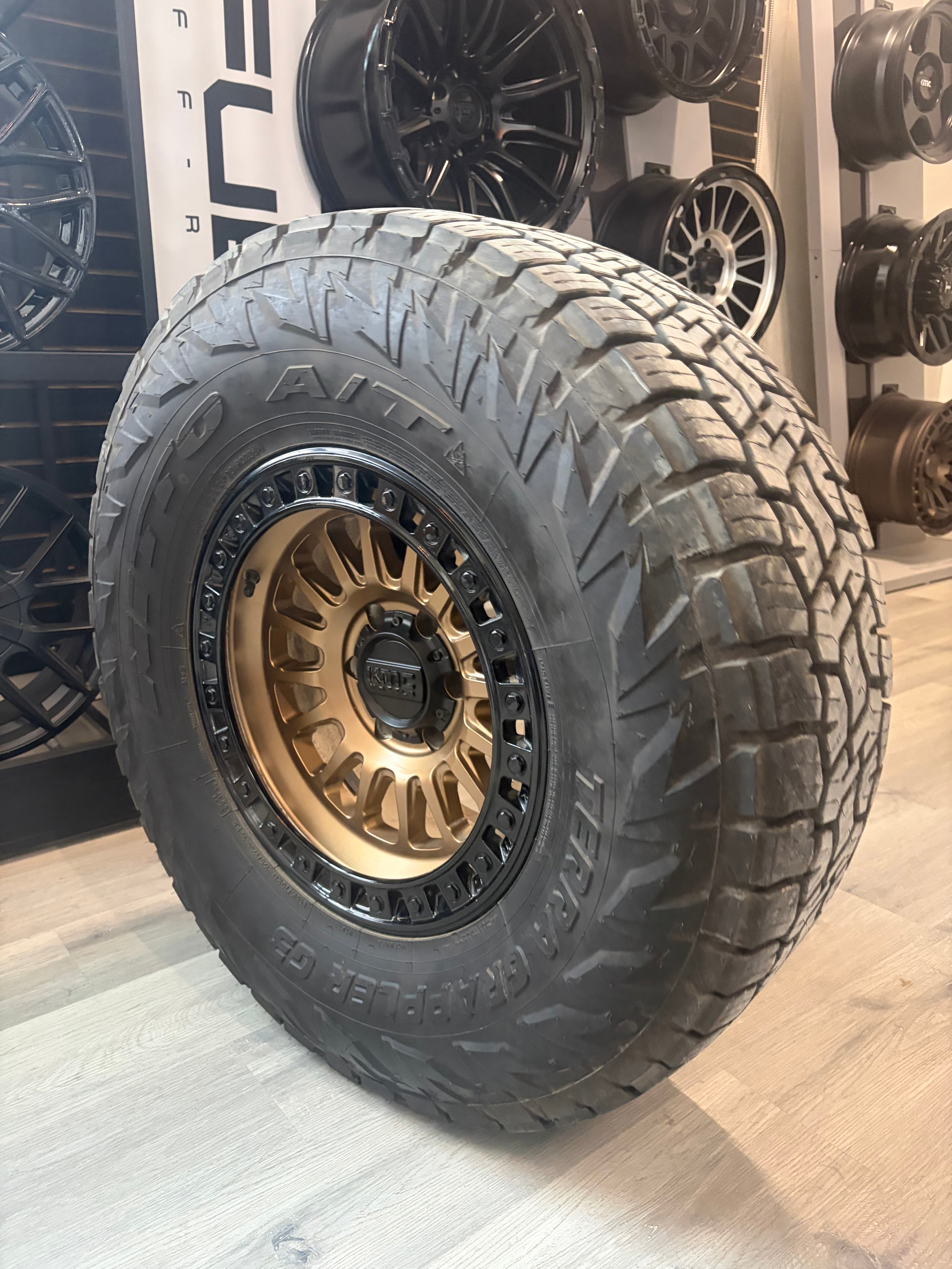 ( SET OF FOUR ) KMC IMS 17X8.5 -10 6X135 87 M-BRNZ G-BLK | 315/70R17 NITTO G3 3PMS *TAKE OFF*