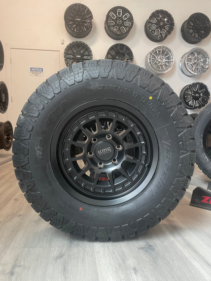 ( SET OF FOUR ) KMC KM719 17X8.5 0 6X139.7 SATIN BLACK | 285/70R17 AMP TERRAIN PRO
