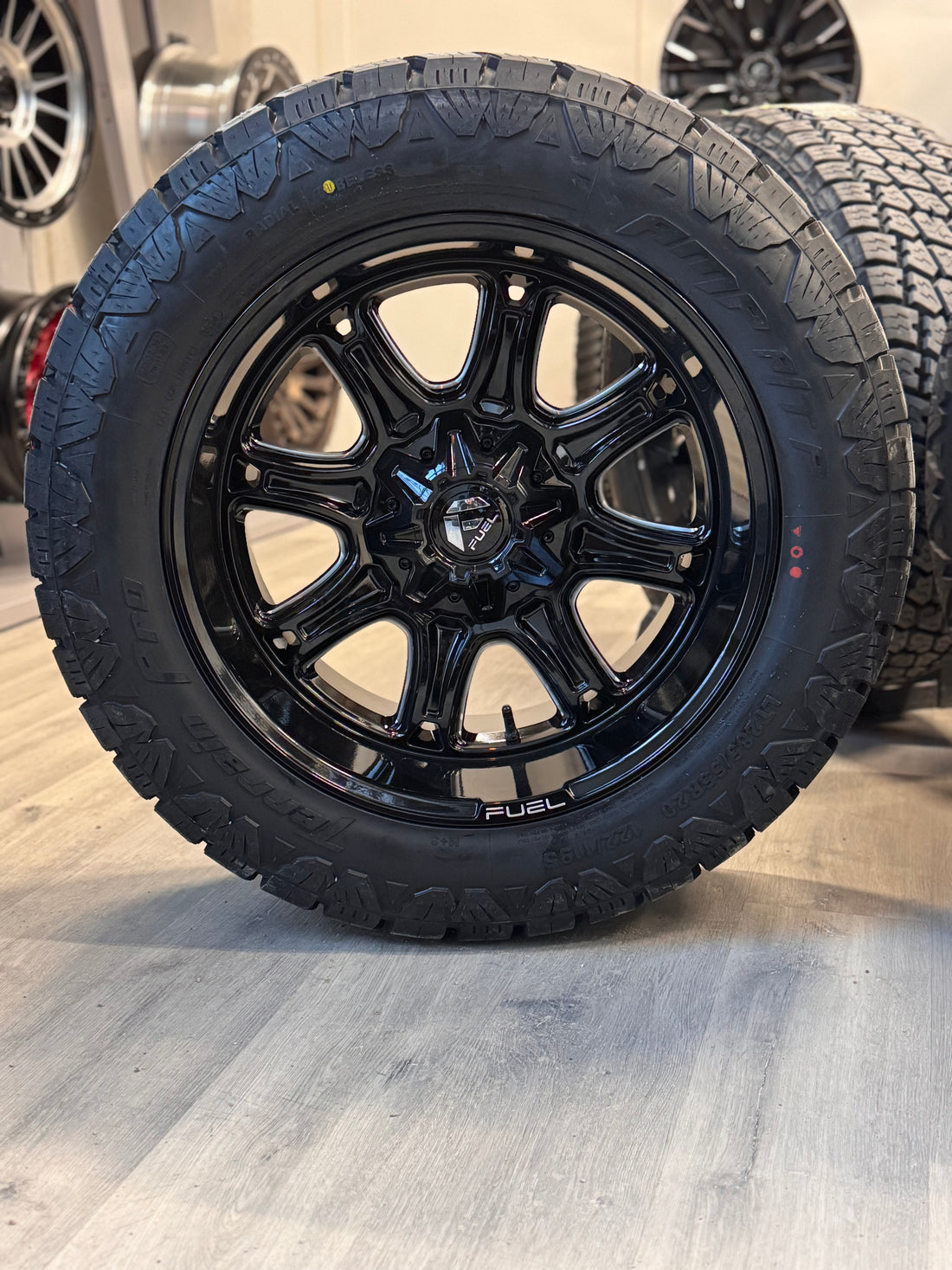 (SET OF FOUR) FUEL DARKSTAR GLOSS BLK MILLED 20X10 6X135/6X139.7 -18 106.1MM | 285/55R20 AMP TERRAIN PRO