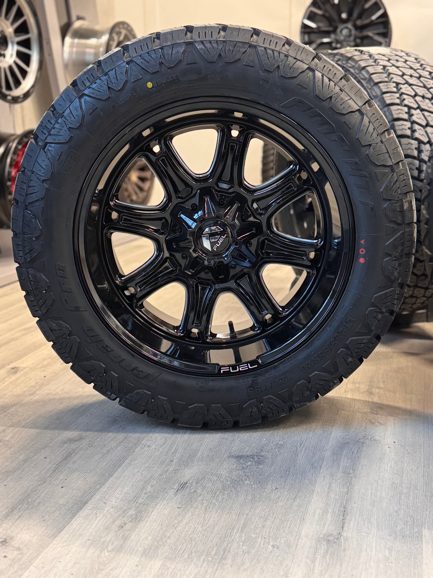 (SET OF FOUR) FUEL DARKSTAR GLOSS BLK MILLED 20X10 6X135/6X139.7 -18 106.1MM | 285/55R20 AMP TERRAIN PRO