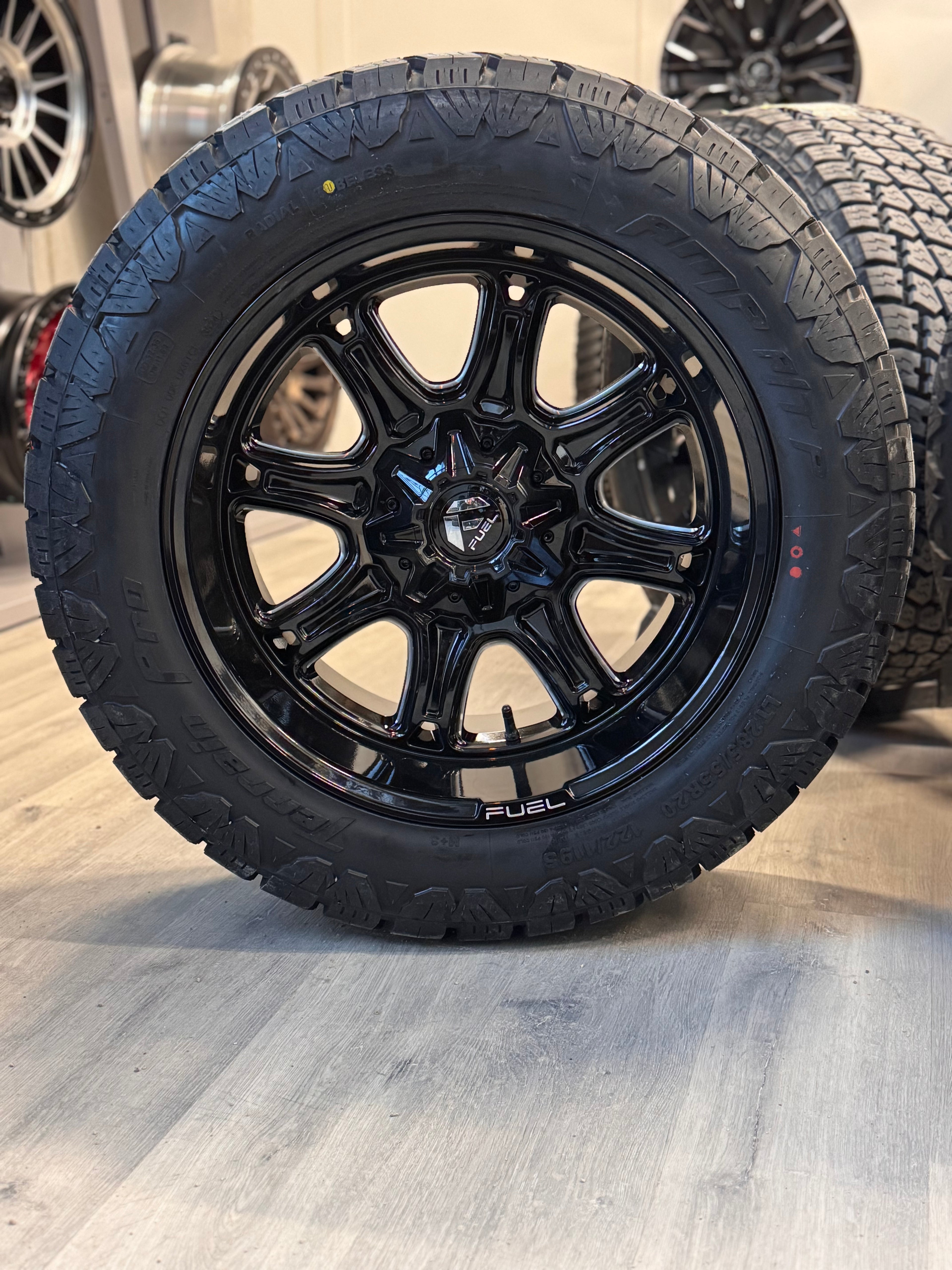 (SET OF FOUR) FUEL DARKSTAR GLOSS BLK MILLED 20X10 6X135/6X139.7 -18 106.1MM | 285/55R20 AMP TERRAIN PRO