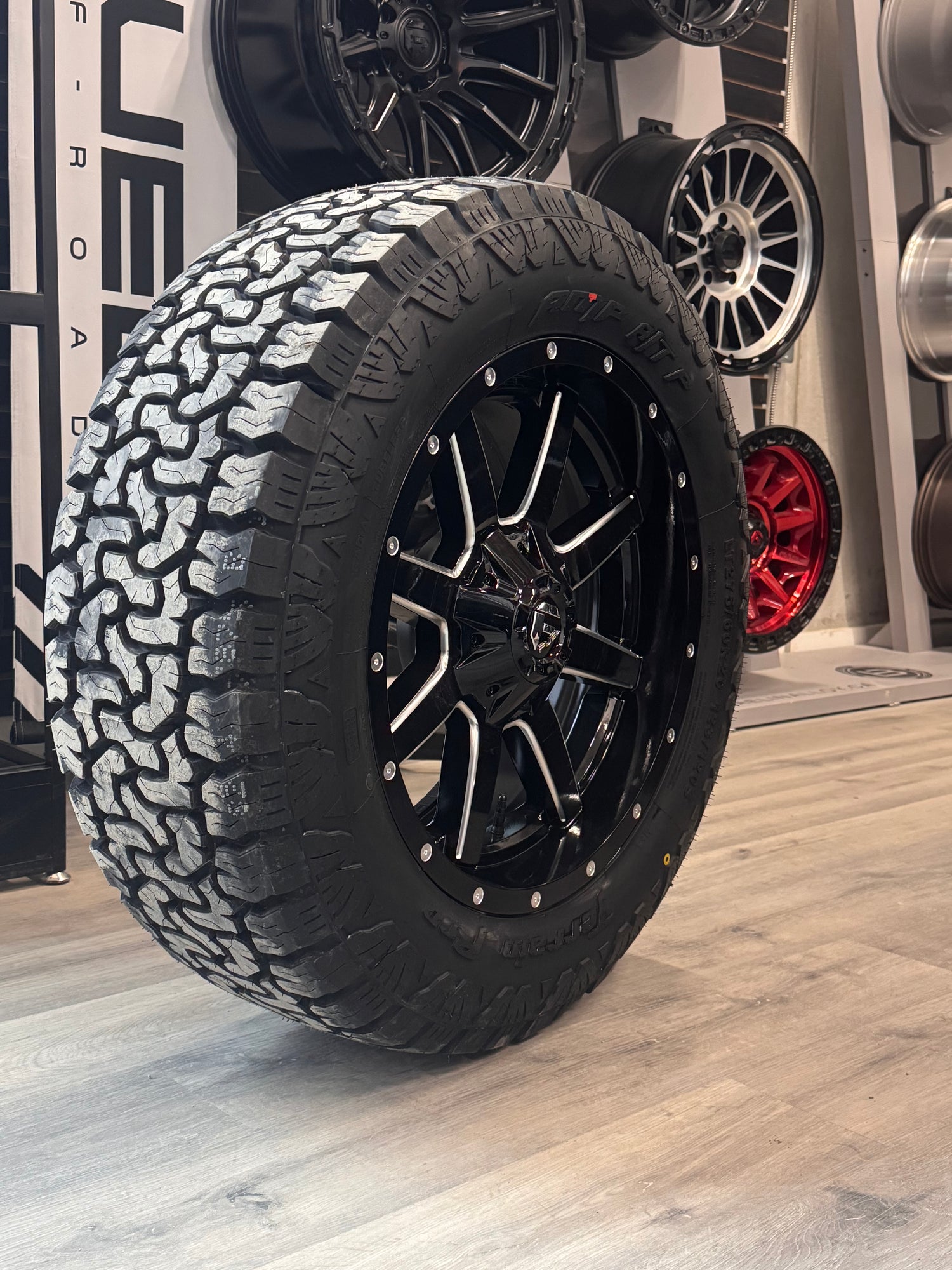 ( SET OF FOUR ) FUEL MAVERICK 20X9 +1 6X135/6X139.7 106.1 GLOSS BLK MILL | LT 275/60R20 AMP TERRAIN PRO