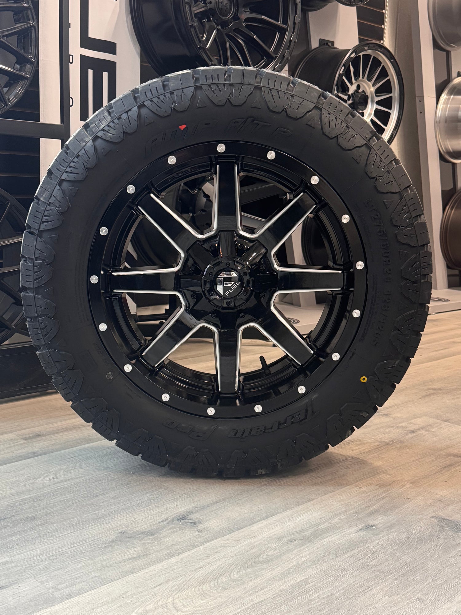 ( SET OF FOUR ) FUEL MAVERICK 20X9 +1 6X135/6X139.7 106.1 GLOSS BLK MILL | LT 275/60R20 AMP TERRAIN PRO