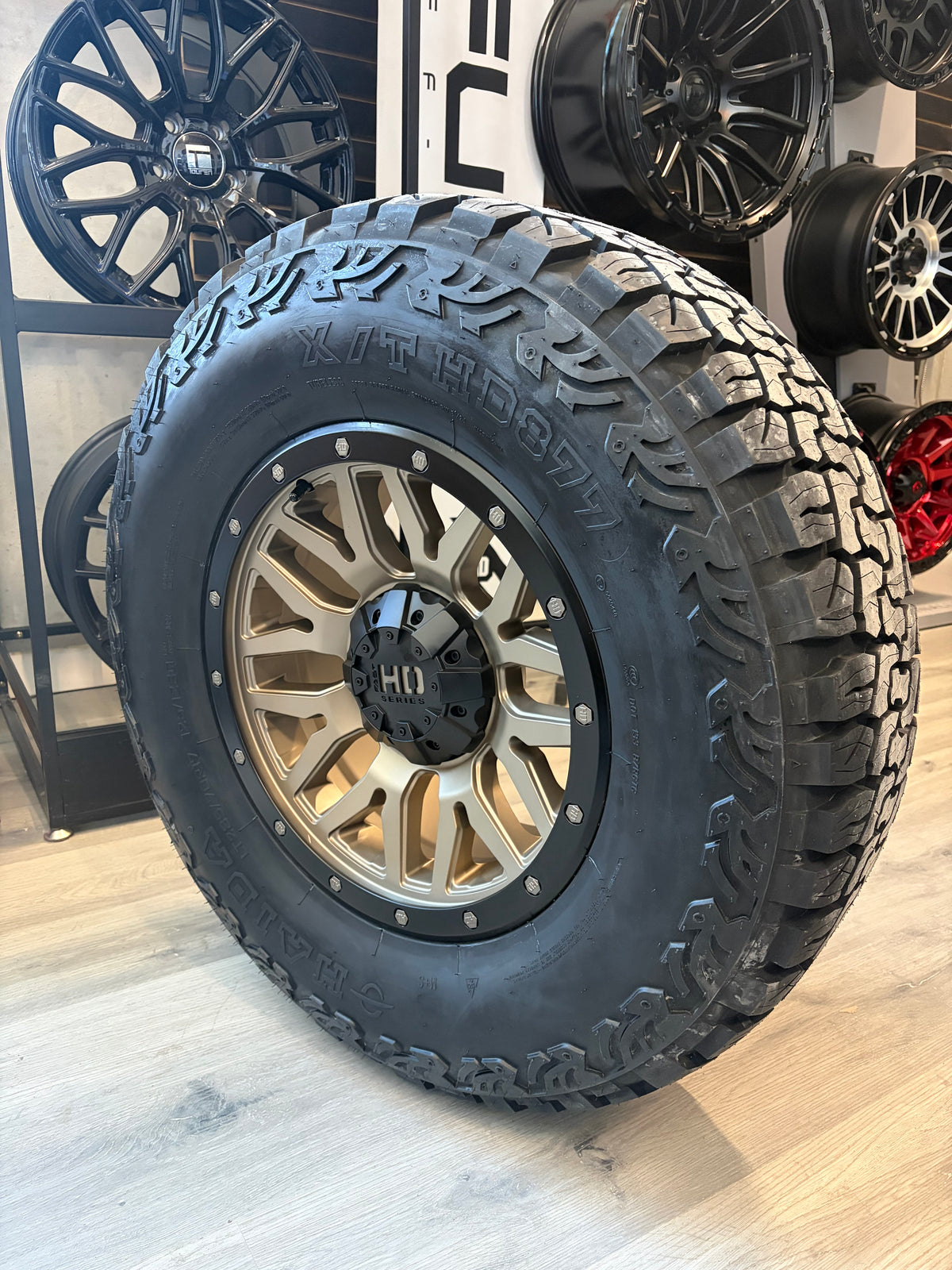 (SET OF FOUR) FAST HD MENACE SATIN BRONZE/BLACK BEADLOCK 17X8 +0 6X139.7MM 106.1MM | HAIDA HD 877 XT LT 285/70R17 (10 PLY)
