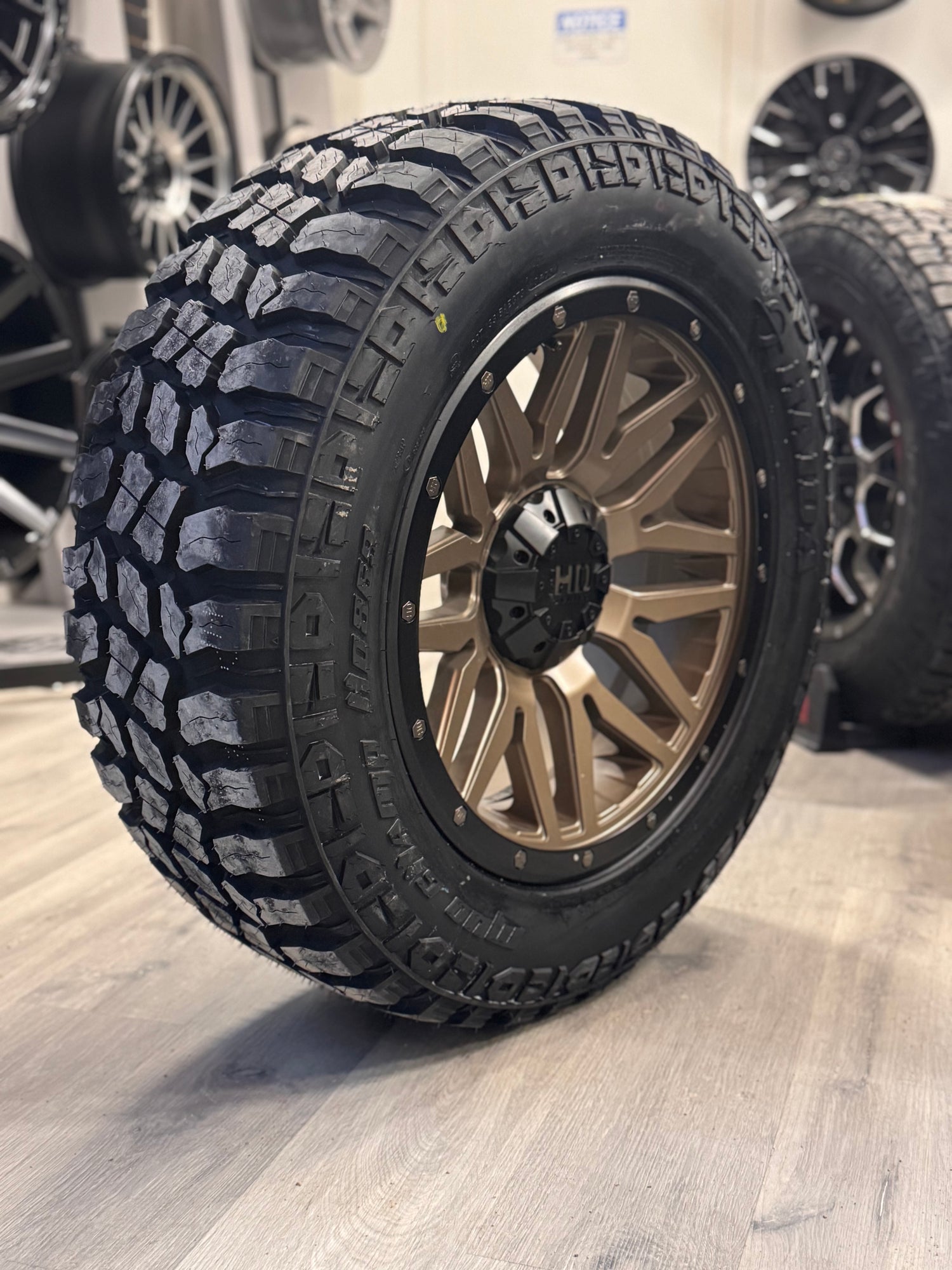 (SET OF FOUR) FAST HD MENACE SATIN BRONZE/BLACK BEADLOCK 20X9 +0 6X139.7MM 106.1MM | 275/60R20 HAIDA 869 MUD CHAMP 3PMS