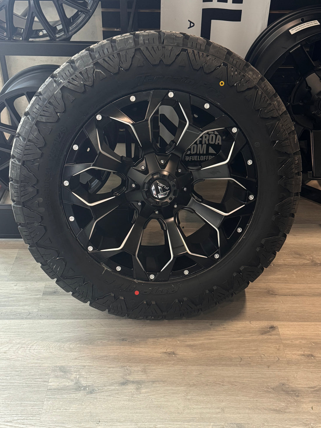 ( SET OF FOUR ) FUEL ASSAULT MATTE BLACK MILLED 20X9 +20 6X135/6X139.7 | 285/60R20 AMP TERRAIN PRO