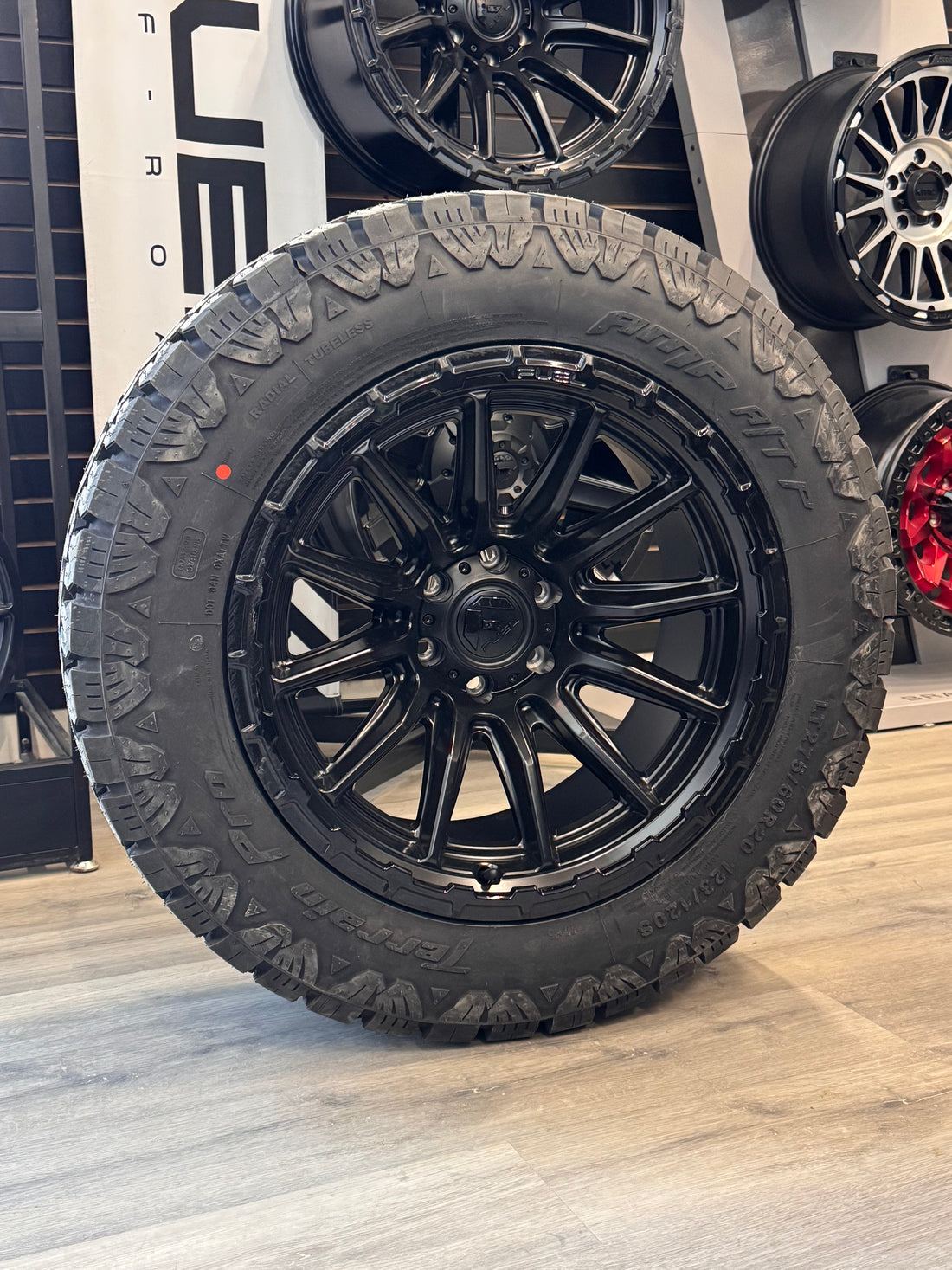 ( SET OF FOUR ) FUEL PISTON 20X10 -18 6X135 87 BLACKOUT W/ GLOSS BLACK LIP | AMP TERRAIN PRO 275/60R20