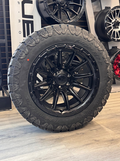 ( SET OF FOUR ) FUEL PISTON 20X10 -18 6X135 87 BLACKOUT W/ GLOSS BLACK LIP | AMP TERRAIN PRO 275/60R20