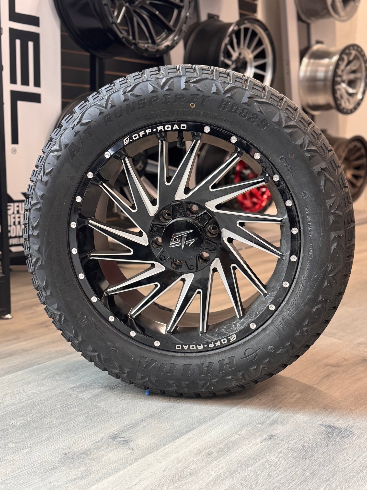 (SET OF FOUR) GT OFF-ROAD TOMAHAWK GLOSS BLACK MILLED 20X9 +12 6X135/6X139.7 | 275/55R20 HAIDA 829 AT 10PLY