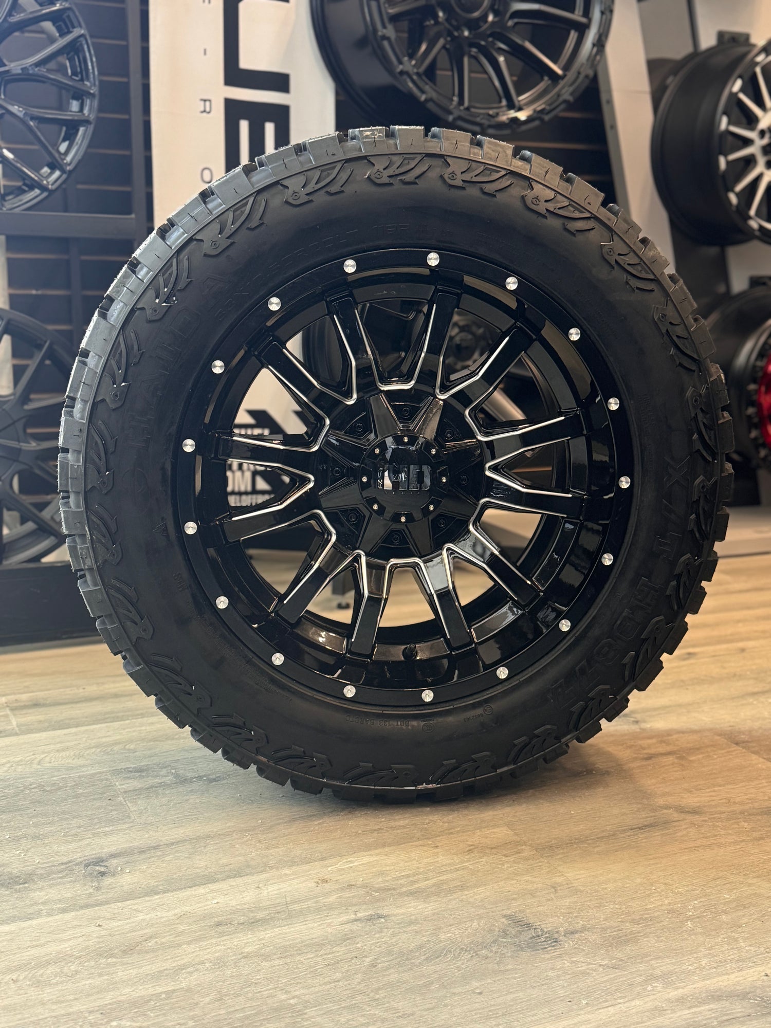 (SET OF FOUR) FAST HD TRAXX GLOSS BLACK MILLED 20X10 -18 6X135/6X139.7MM 95.1MM | LT 33X12.50R20 HAIDA XT 877 3PMS