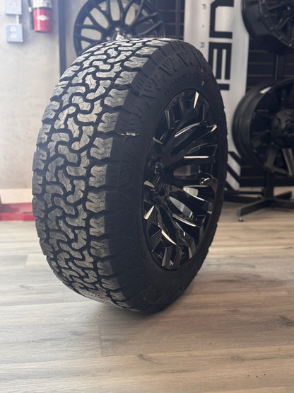 (SET OF FOUR) FUEL QUAKE 20X10 6X135 -18 GLOSS BLACK MILLED | LT 275/60R20 AMP TERRAIN PRO