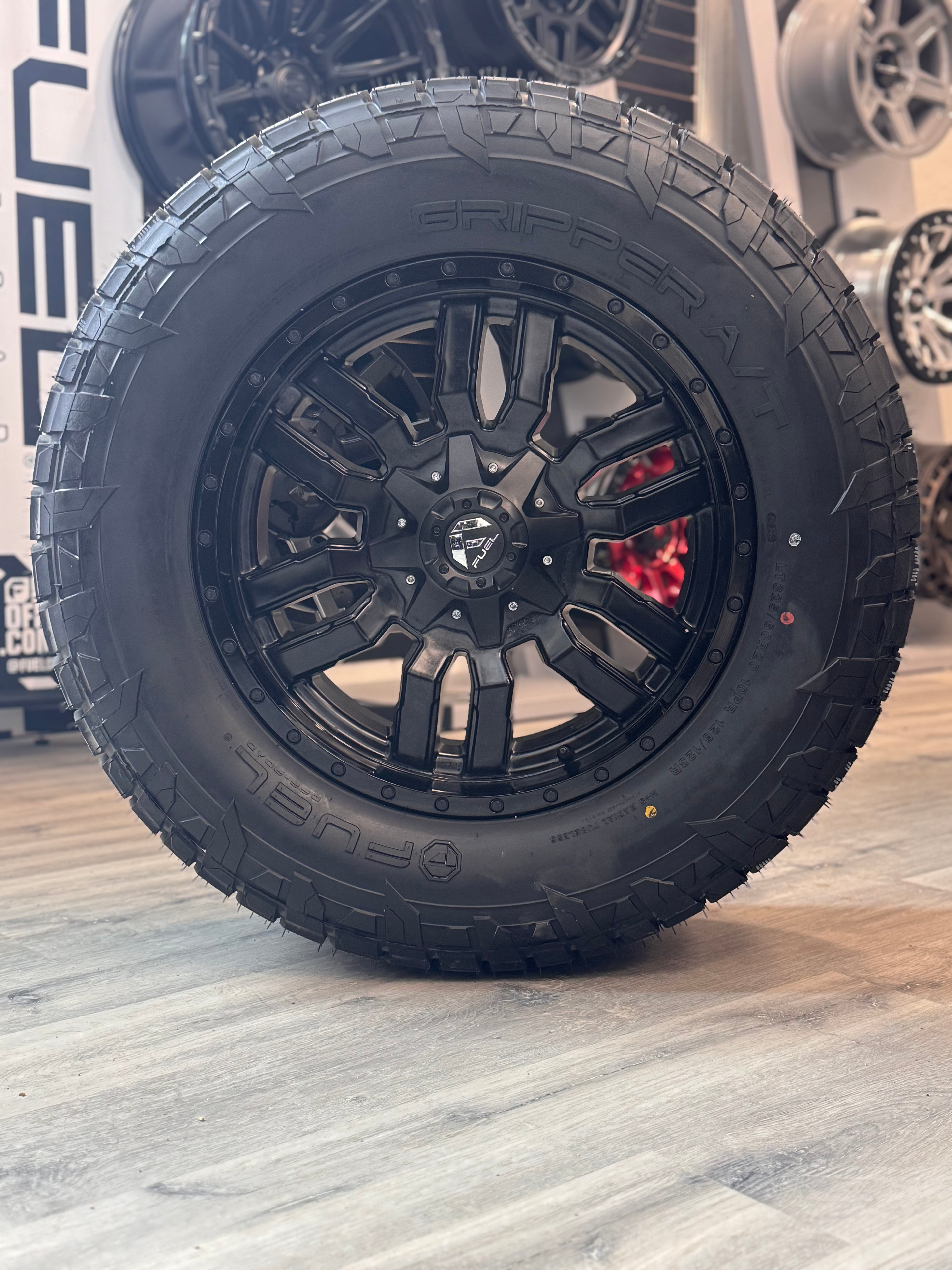 (SET OF FOUR) Fuel Sledge 20x9 8x180 +20 Matte BLK/Gloss BLK LIP | FUEL GRIPPER A/T LT 10 PLY 35x12.50R20