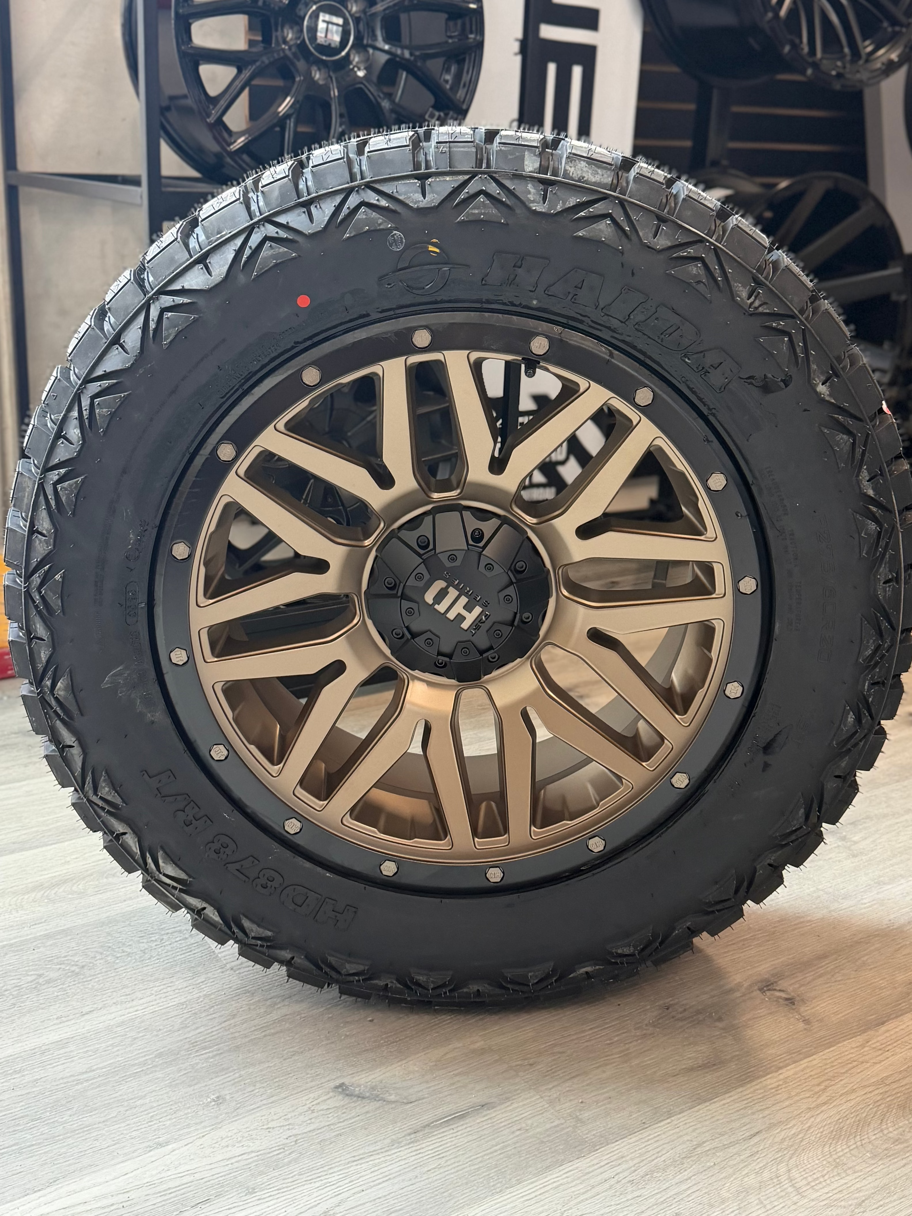 (SET OF FOUR) FAST HD MENACE SATIN BRONZE/BLACK BEADLOCK 20X9 +0 6X139.7MM 106.1MM | 275/60R20 HAIDA 878 Rugged Terrain