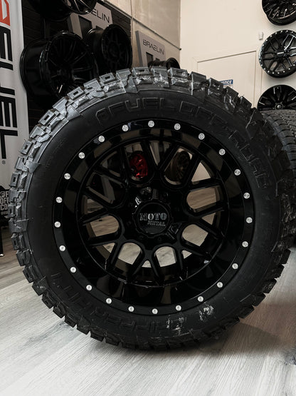( SET OF FOUR ) MOTO METAL MO986 GLOSS BLACK 20X10 6X135/6X139.7 -18 | 285/55R20 LT FUEL GRIPPER AT2