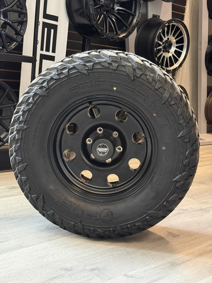 (SET OF FOUR) AMERICAN RACING AR172 BAJA 17X8 +0 6X139.7 108MM SATIN BLK | LT 33X12.50R17 FUEL GRIPPER M/T