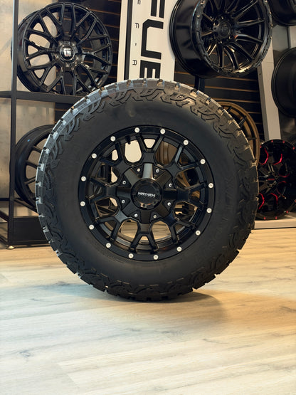 (SET OF FOUR) MAYHEM WARRIOR 8015 MATTE BLACK 17X9 6X135/6X139.7 -12MM 106MM | LT 265/70R17 HAIDA 877 3PMS