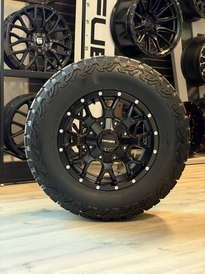 (SET OF FOUR) MAYHEM WARRIOR 8015 MATTE BLACK 17X9 6X135/6X139.7 -12MM 106MM | LT 265/70R17 HAIDA 877 3PMS