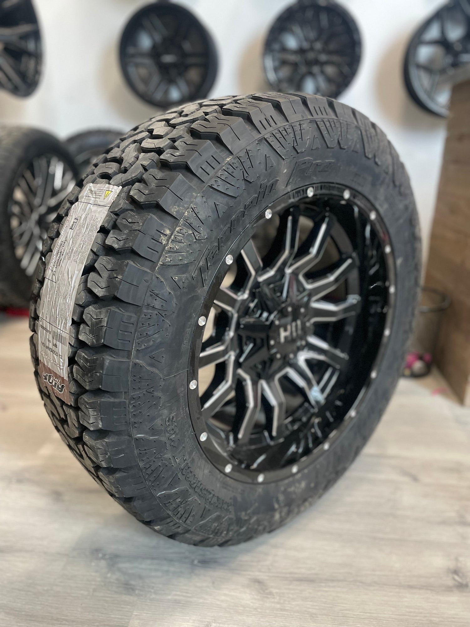 (SET OF FOUR) Fast Traxx 20x10 8x165.1 -15 Gloss BLK Milled | 33x12.50r20 Amp Terrain Pro ( Ram 2500, GM 2500 )