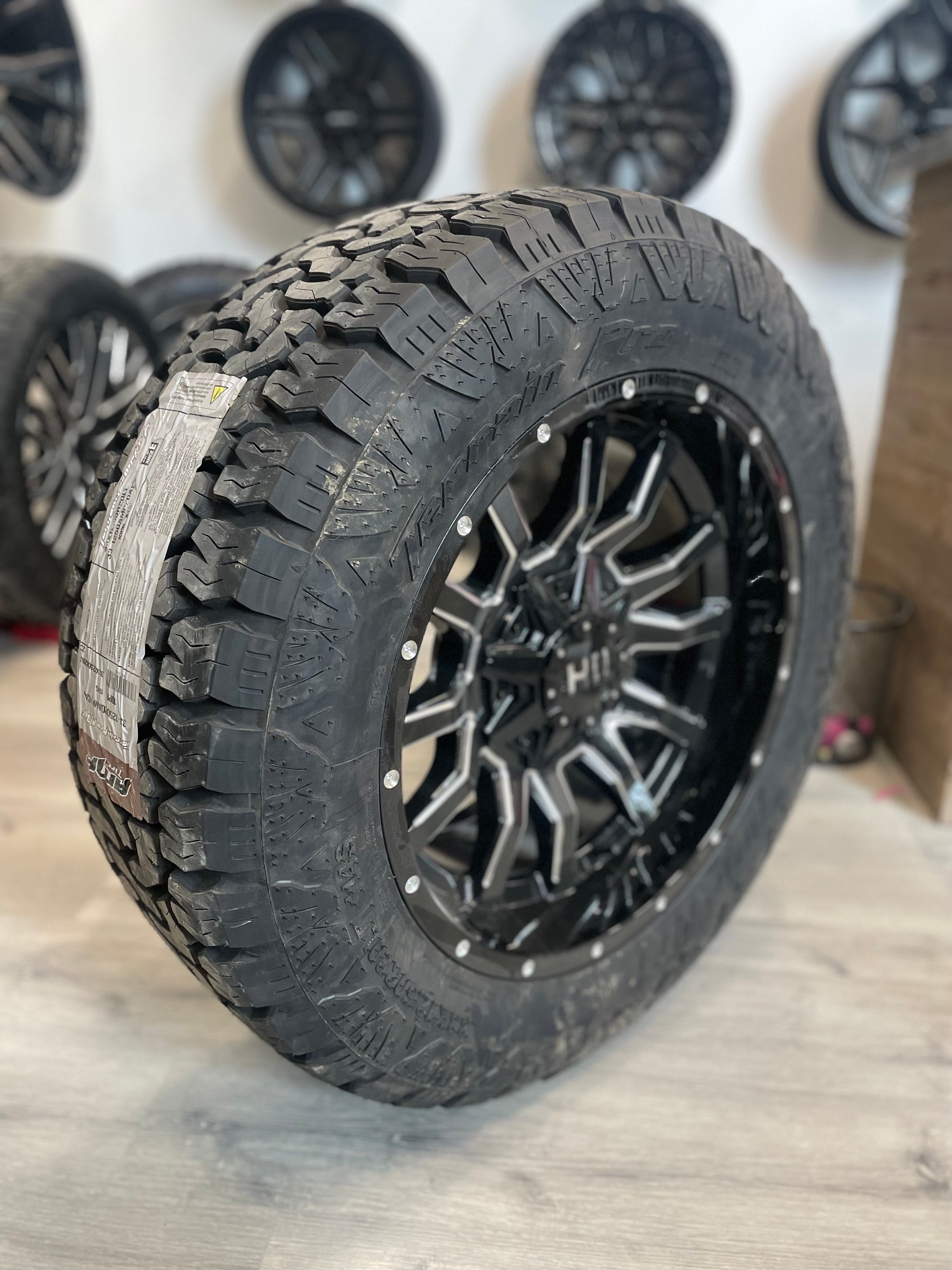 (SET OF FOUR) Fast Traxx 20x10 8x165.1 -15 Gloss BLK Milled | 33x12.50r20 Amp Terrain Pro ( Ram 2500, GM 2500 )