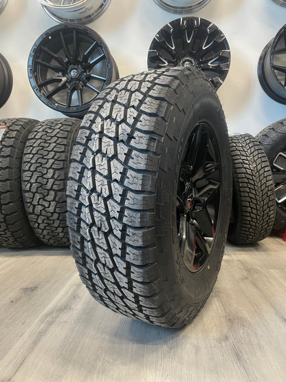 (SET OF FOUR) CHEVY/GMC TRAILBOSS OEM R245 17x8 6x139.7 +24 Gloss BLK | 265/70r17 NITTO TERRA GRAPPLER  ( Sierra, Silverado, Yukon, Tahoe )