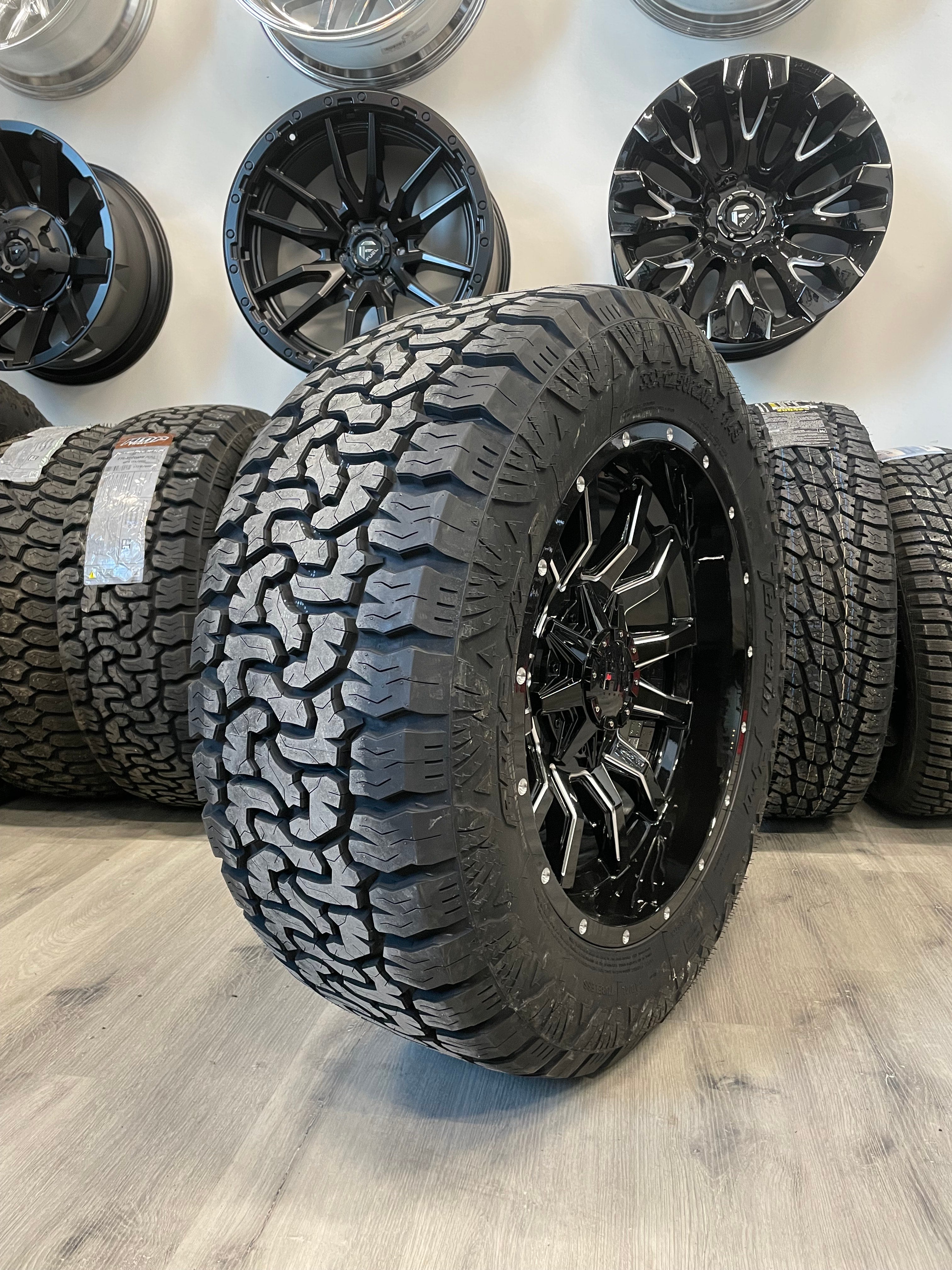 (SET OF FOUR) Fast Traxx 20x10 5x127/5x139.7 -15 BLK Milled | LT33x12.50r20 10 PLY Amp Terrain Pro AT ( RAM 1500/JEEP )