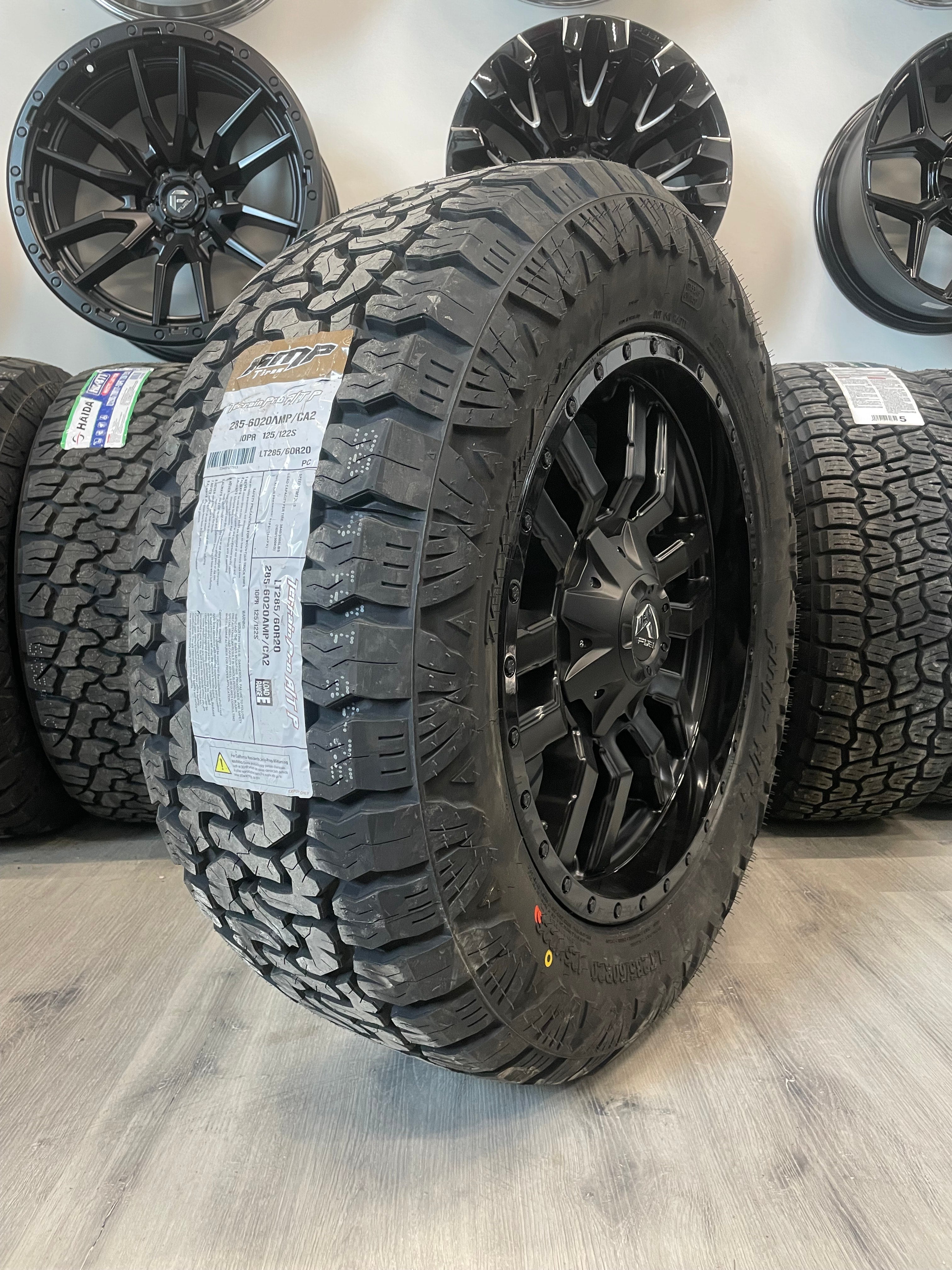 (SET OF FOUR) Fuel Sledge 20x9 8x180 +20 Matte BLK/Gloss BLK Lip | LT285/60r20 Amp Terrain Pro